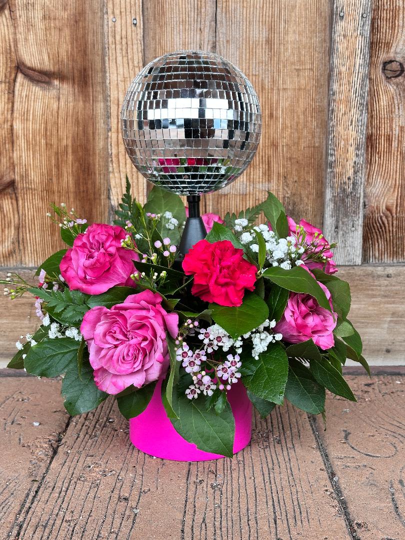 Dazzling Disco Ball - Add a touch of sparkle this Valentine's Day with our ROTATING, LIGHT UP, Dazzling Disco Ball flower arrangement - where romance meets retro glamour! 