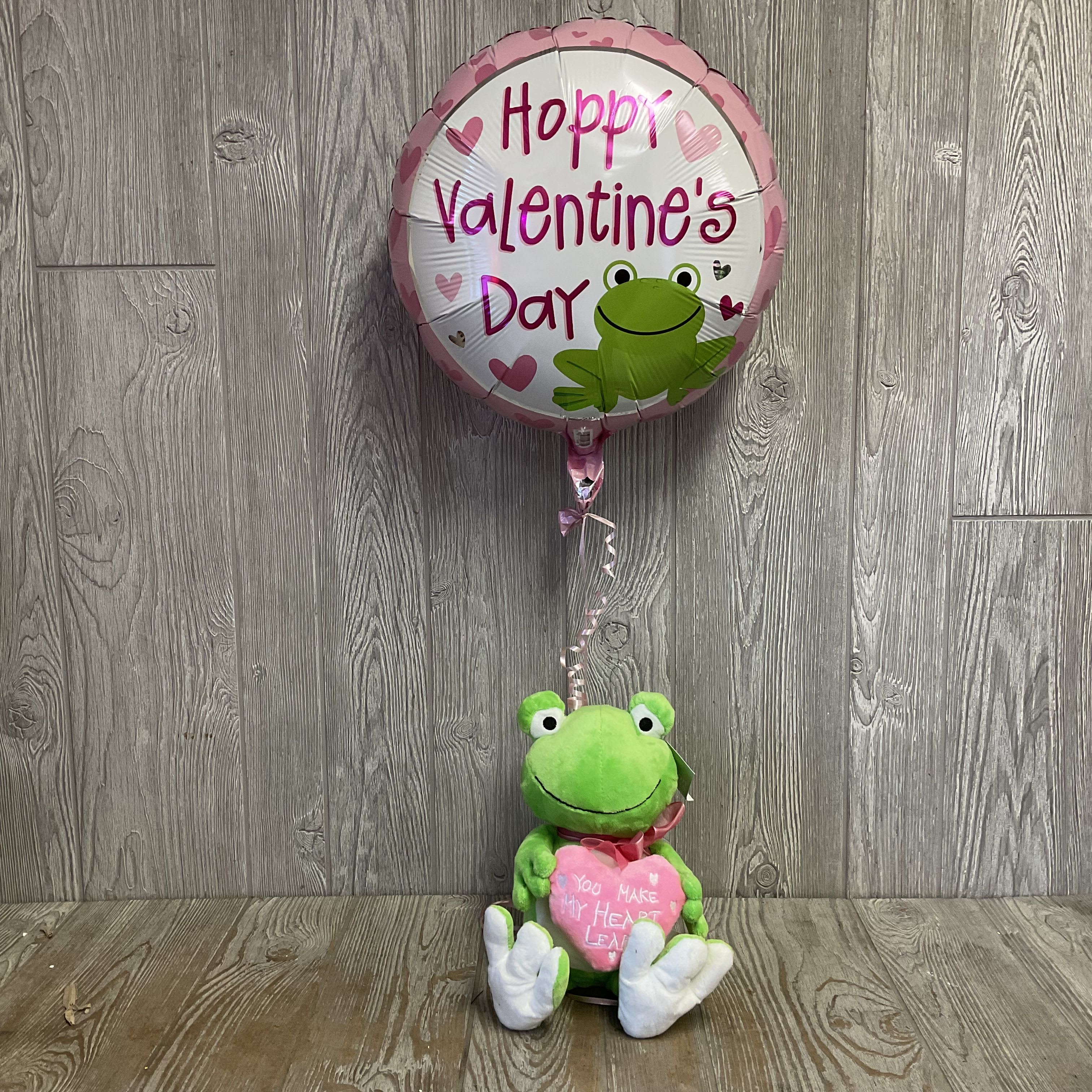 Hoppy Valentine’s Day! - This frog says it all!  Holding a heart that reads “ You make my heart leap,” and accompanied by a matching balloon, he’s the perfect way to express your feelings. 