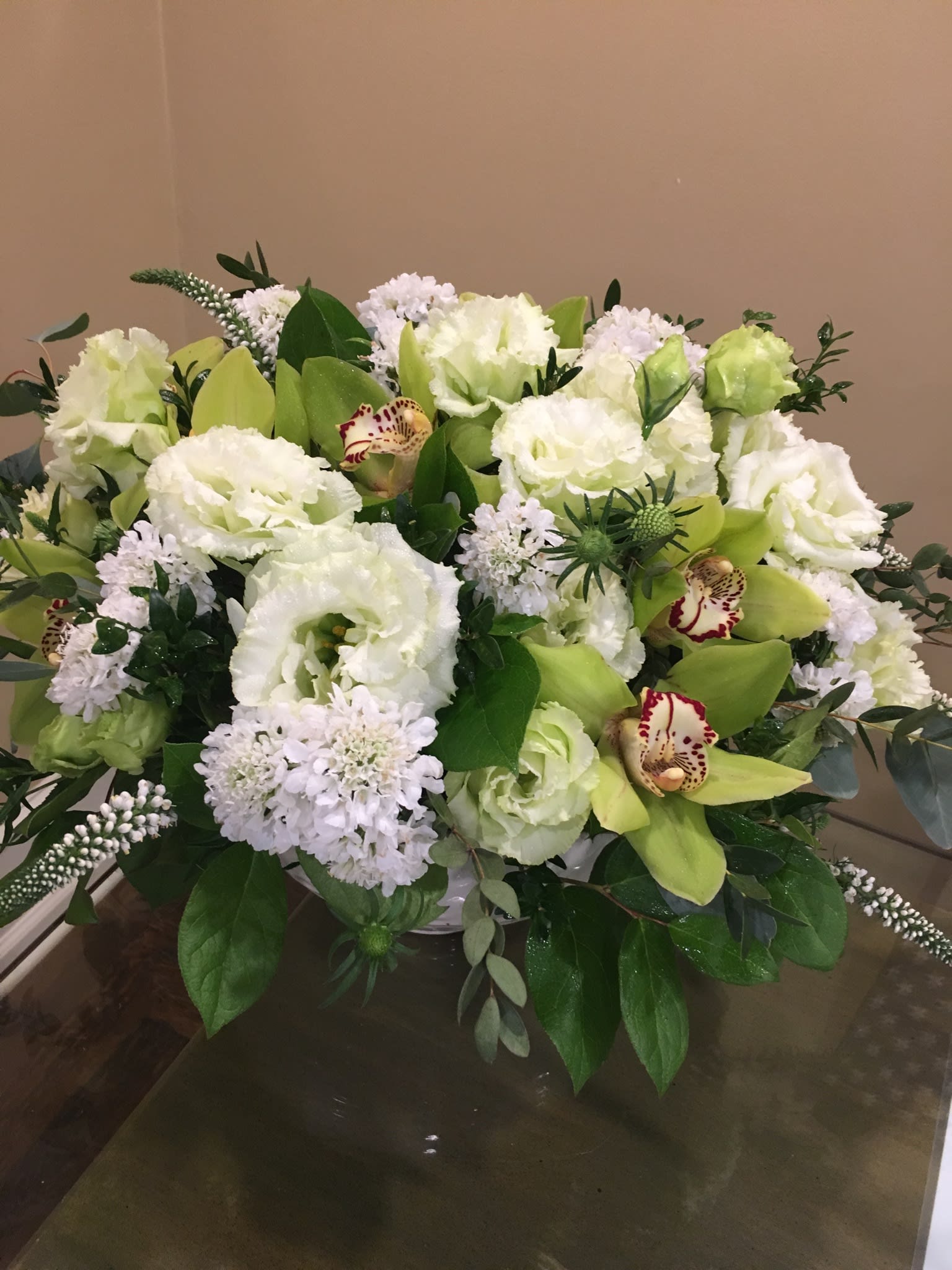 Green orchids and White Flowers - Looking for a simple and elegant color palette? White and green will do. Enjoy a beautiful collection of orchids, lisimachia, lisianthus and other beautiful white blossoms.