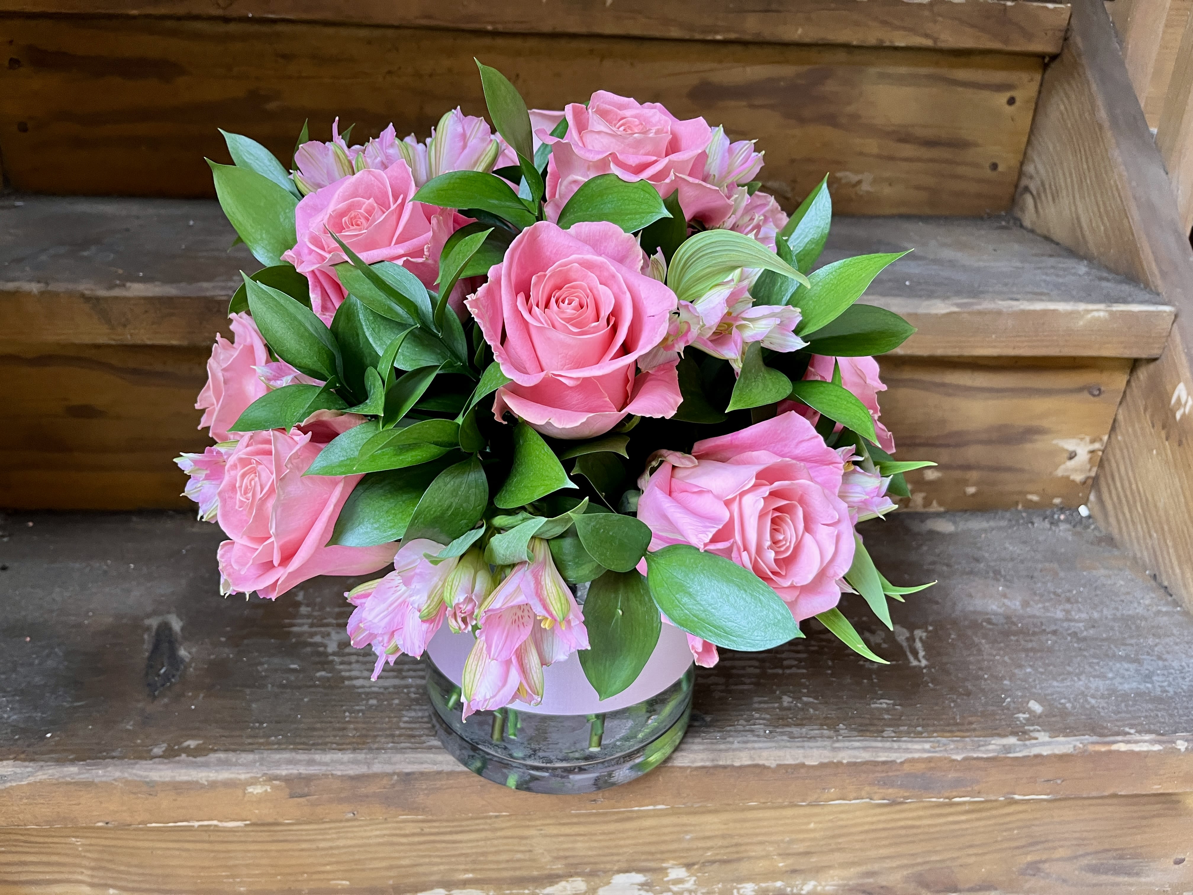 Hermosa Baby - Available Week of Valentines - The Fab Hermosa Roses in a low vase with Pink Alstromeria and Dark Greens