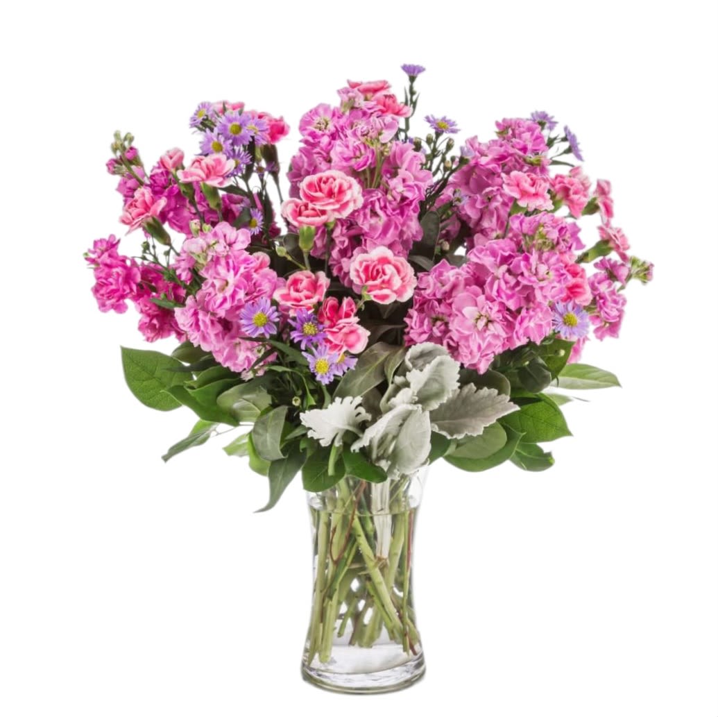 Uptown Girl by BloomNation™ - This arrangement is a pink and purple confection featuring sweet-smelling stock flowers. A great gift for birthdays, women's day, or breast cancer awareness month.  Approximate Dimensions: 12"D x 17"H