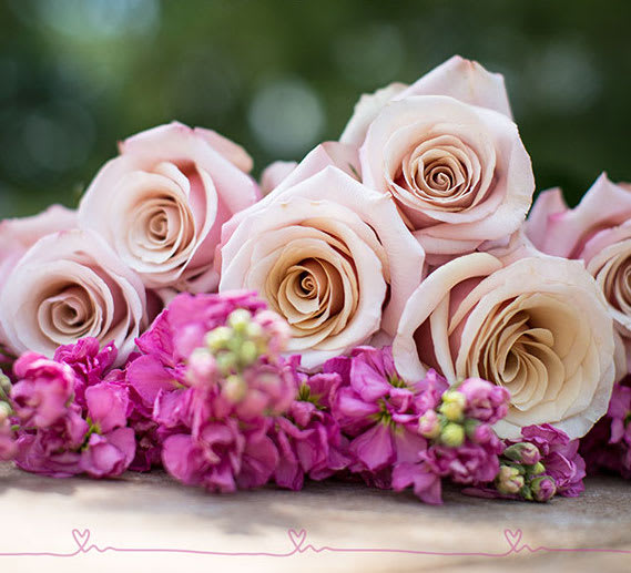 Valentine's day Designer collection - Loose wrap flowers prepared with the freshest blossoms of the day on order just for you. The picture does not reflect the exact content of the items. This is Wrap bouquet of loose stems, specific blooms can vary. Larger size are provided with upgrades, collection varies upon daily inventory and may be different from picture.