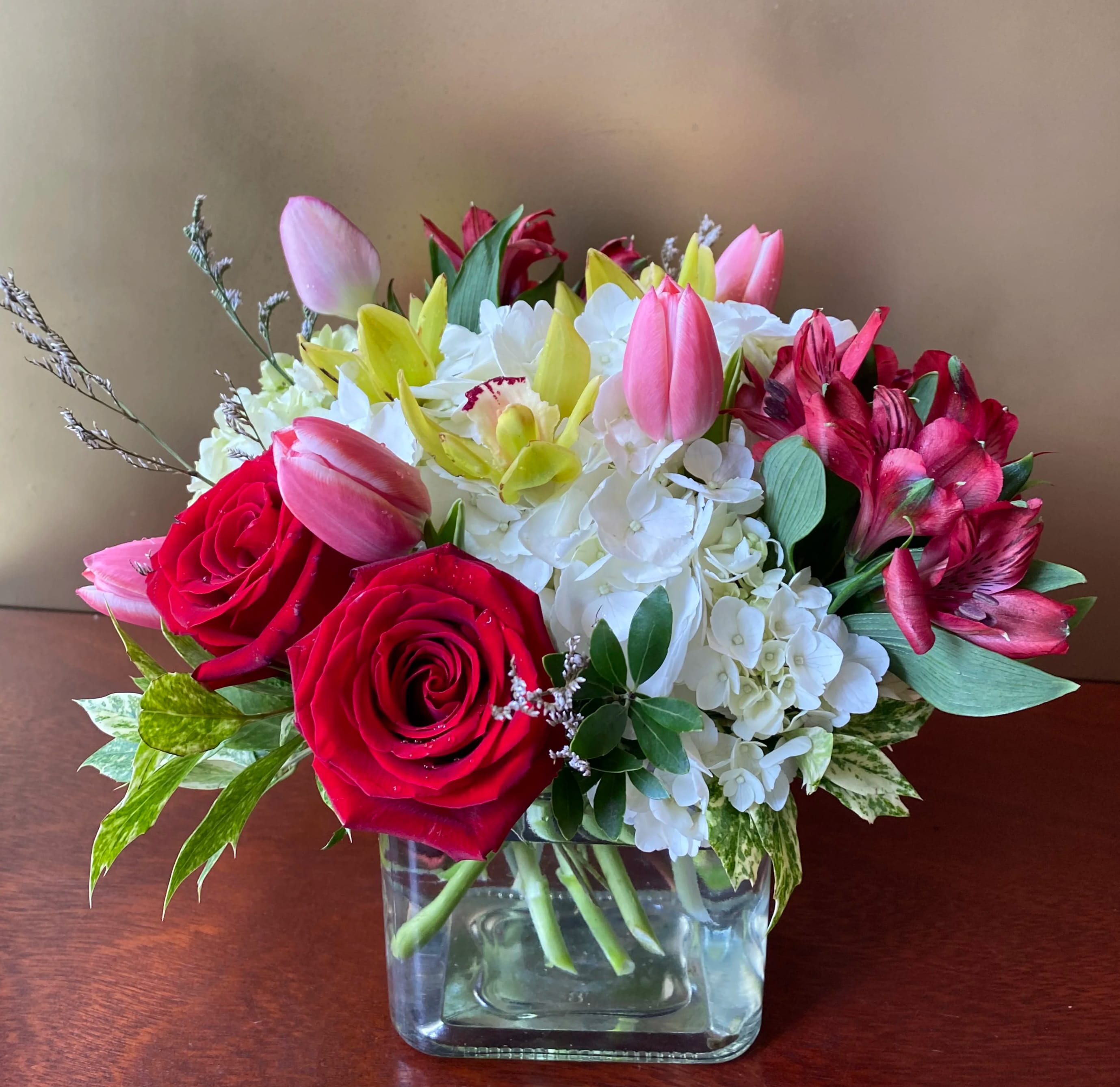 Shining Heart Bouquet  - A gift with heart! What a stylish way to surprise your beloved with a beautiful bouquet of red roses and red alstromeria.   