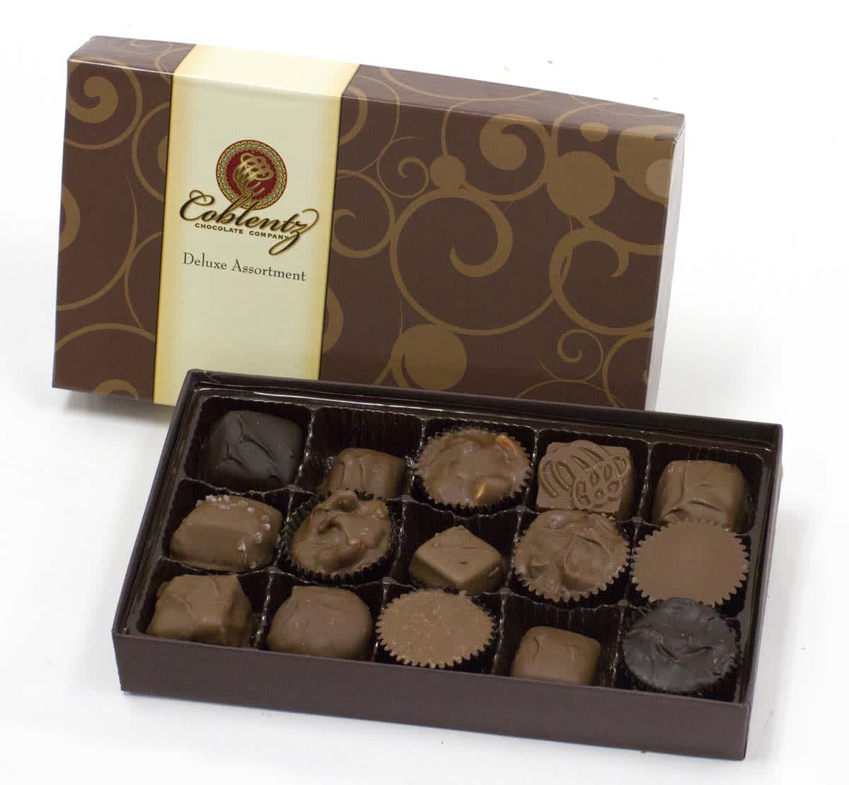 Coblentz Chocolate Deluxe Assortment 8oz - Filled with Coblentz Chocolates favorites such as Caramels, Creams, Clusters, Meltaways and more, there is sure to be something to please everyone's palate in this box! The Deluxe Assortment consists of a majority of milk chocolate with several pieces of dark chocolate included.