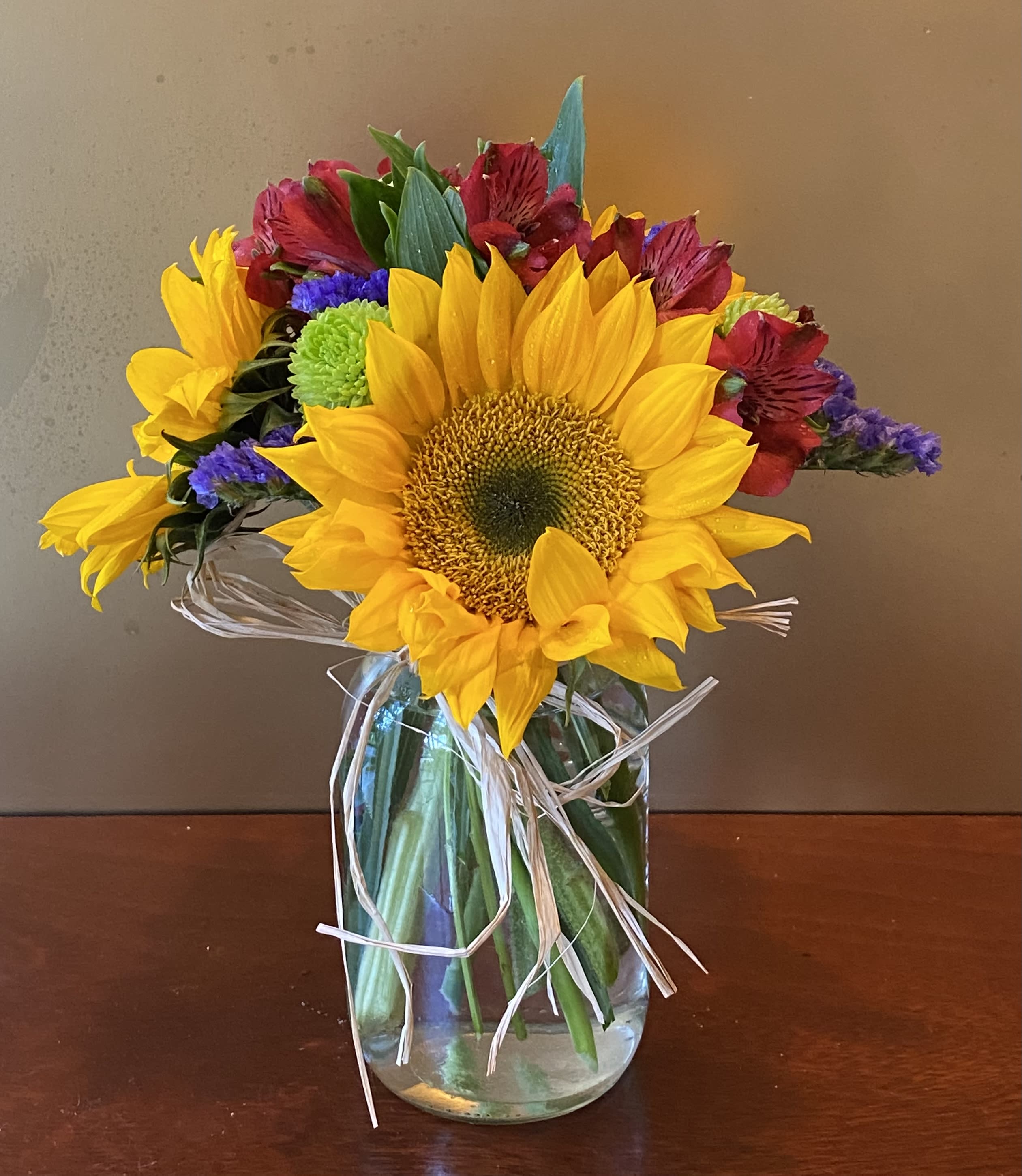 Sunny Flower  - A classic arrangement of sunflowers, alstroemerias, and monte casino 