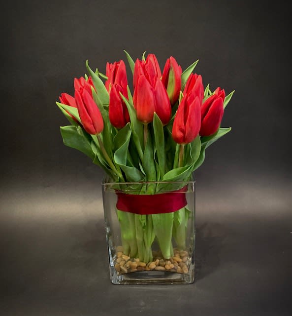Pure Spring- Tulip Colors Will Vary - An effortless look highlighting tulips. Tulip colors will vary based on availability and vases will change based on availability.