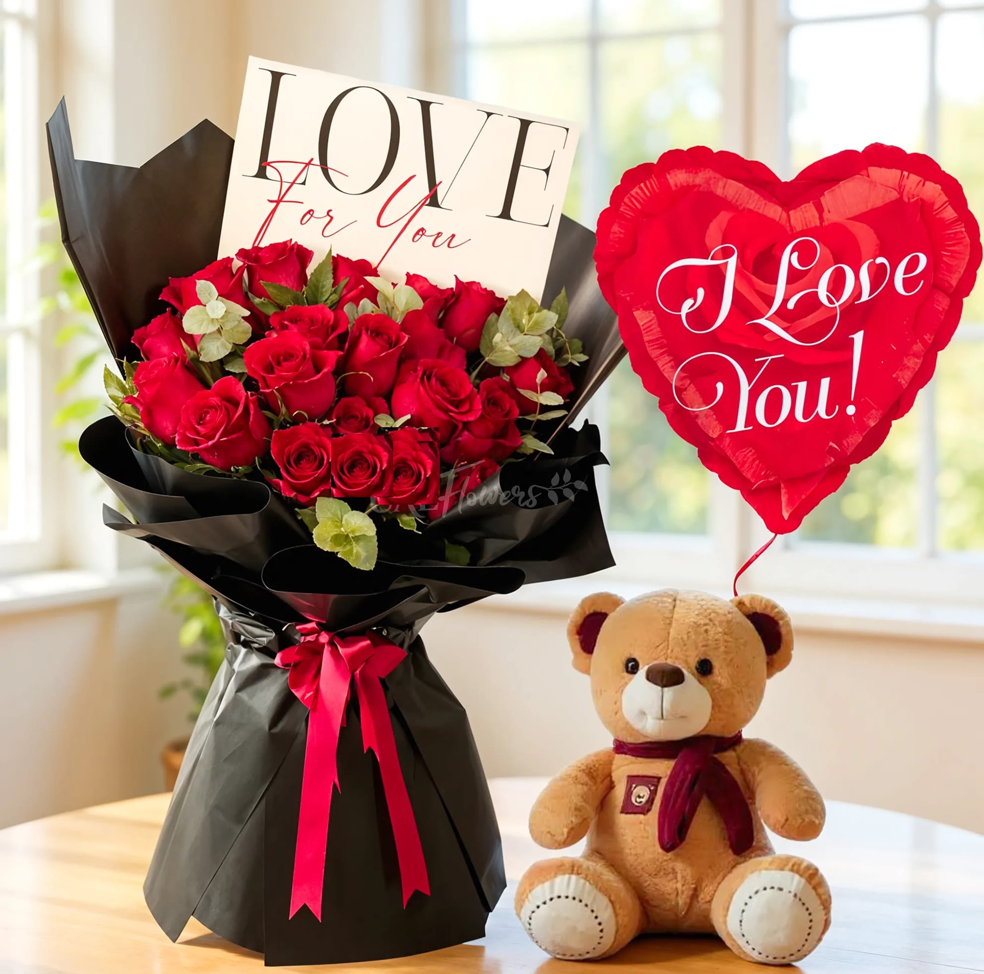 Romantic 24 Roses  gift set  - This romantic gift set features 24 stunning red roses, beautifully complemented by fresh green fillers and wrapped in sleek black paper packing. Accompanying the bouquet is a small, cuddly teddy bear and a heart-shaped I LOVE YOU foil balloon, making this set the perfect expression of love and affection.