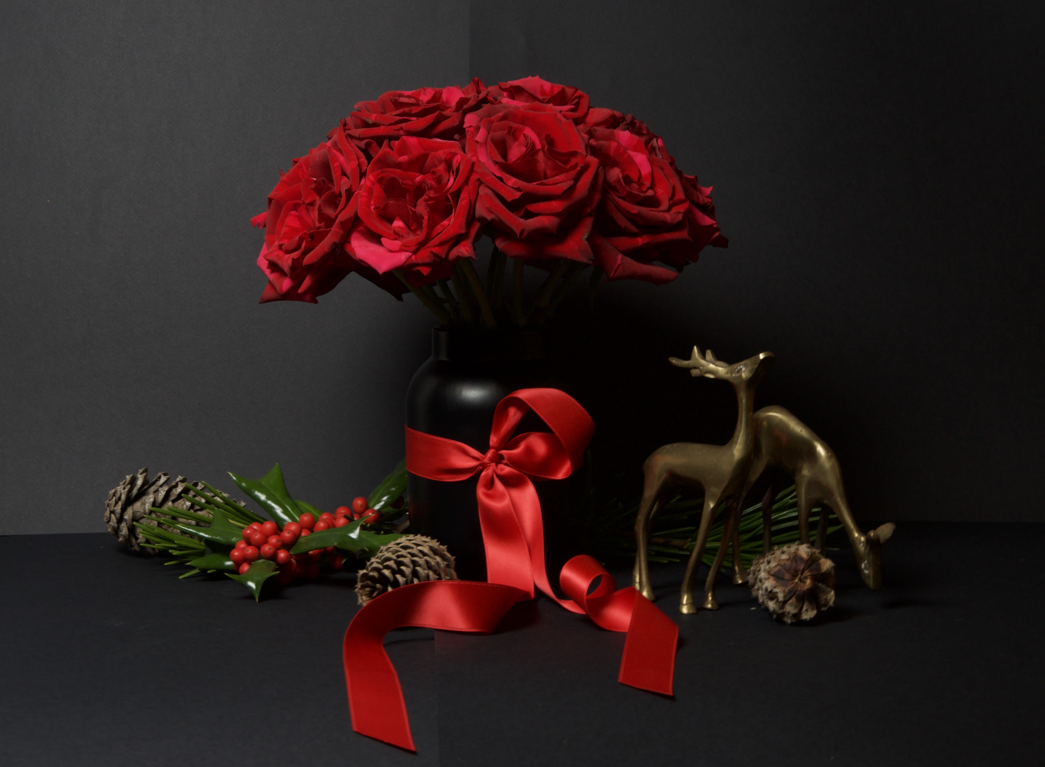 Fift - 20 - The giving of roses has long been associated with love, devotion, and celebration. This pavé arrangement of Panther roses features a dense, velvety surface and rich red tones that create a truly luxurious impression.  Designed in a modern, rounded form, each rose is placed closely together for maximum impact and elegance. Whether shared as a romantic gesture or as a festive seasonal centerpiece, this striking arrangement is a beautiful way to express warmth, admiration, and heartfelt sentiment.  Available in multiple rose counts to suit the occasion.