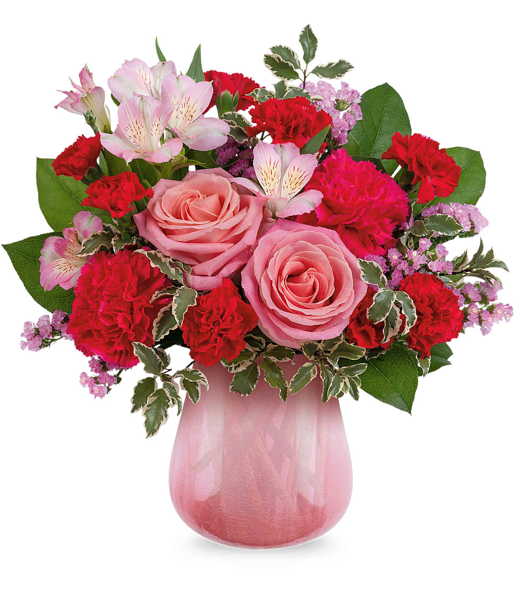 Sweet On Hue Bouquet - Radiating soft sophistication, Teleflora's Pretty In Petal Bouquet blends pink roses, alstroemeria, and carnations in a translucent crackled glass vase with a pink gradient-a chic and heartfelt Valentine's Day gift for your one and only. Teleflora's Pretty In Petal Bouquet features hot pink roses, pink spray roses, pink alstroemeria, pink miniature carnations, white sinuata statice, dusty miller, huckleberry, and leatherleaf fern arranged in Teleflora's Sweet On Hue Vase-a translucent glass vase with a crackled pink gradient. Approximately 14 1/2" W x 13 1/4" H 