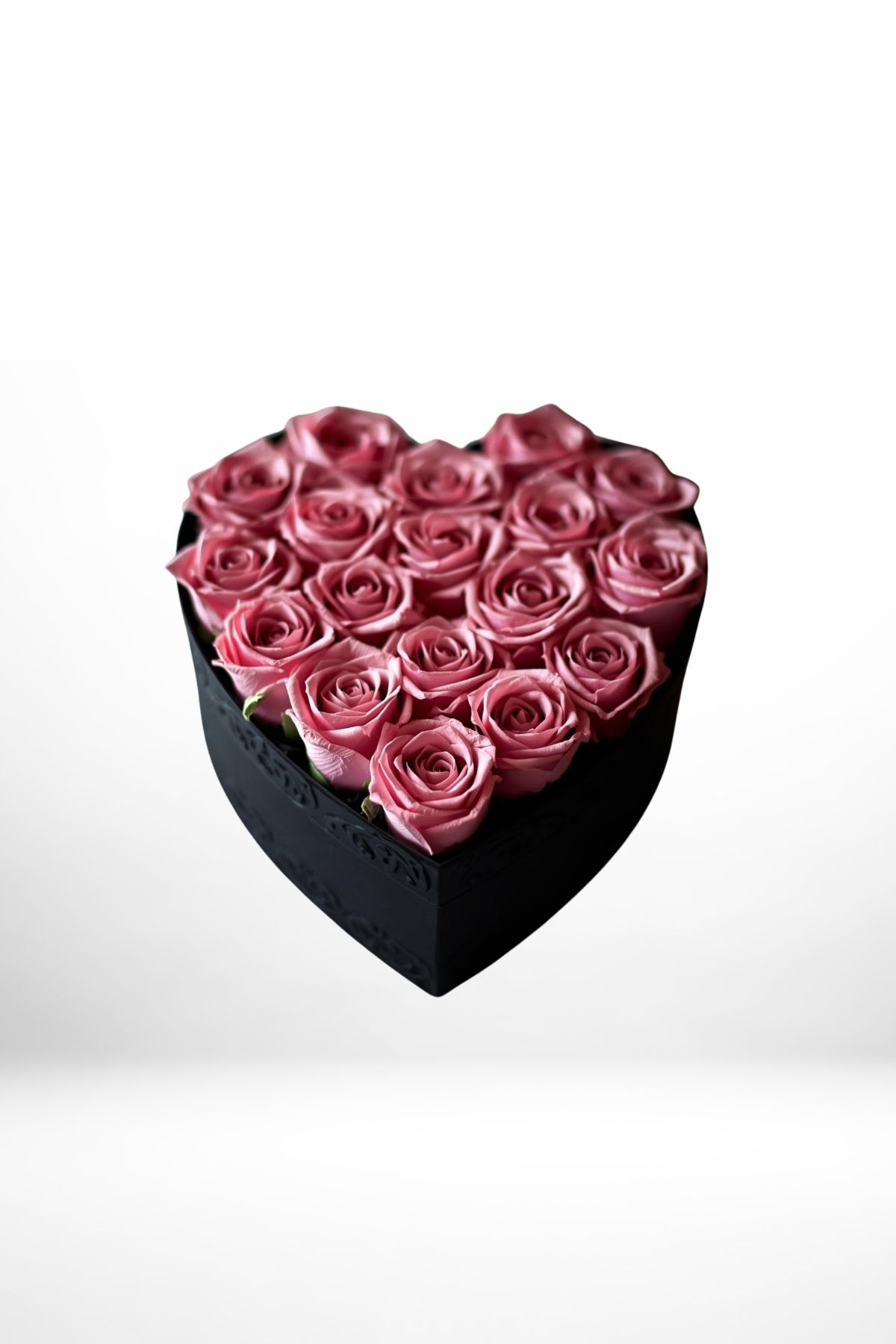 Small Heart Box - A sweet and timeless gesture, our Small Rose Heart Box features premium roses carefully arranged in a signature heart-shaped box. Perfect for expressing love in a meaningful yet understated way, this piece is ideal for thoughtful surprises and intimate moments.