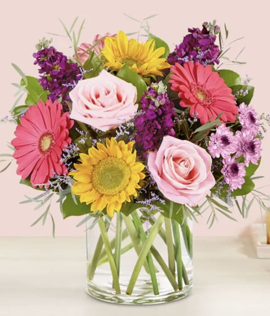 Garden Bloom (Pet Friendly) - Send a sensational surprise to brighten someone’s day. Our garden-fresh bouquet is filled with a cheery mix of blooms—sunflowers, roses, Gerbera daisies