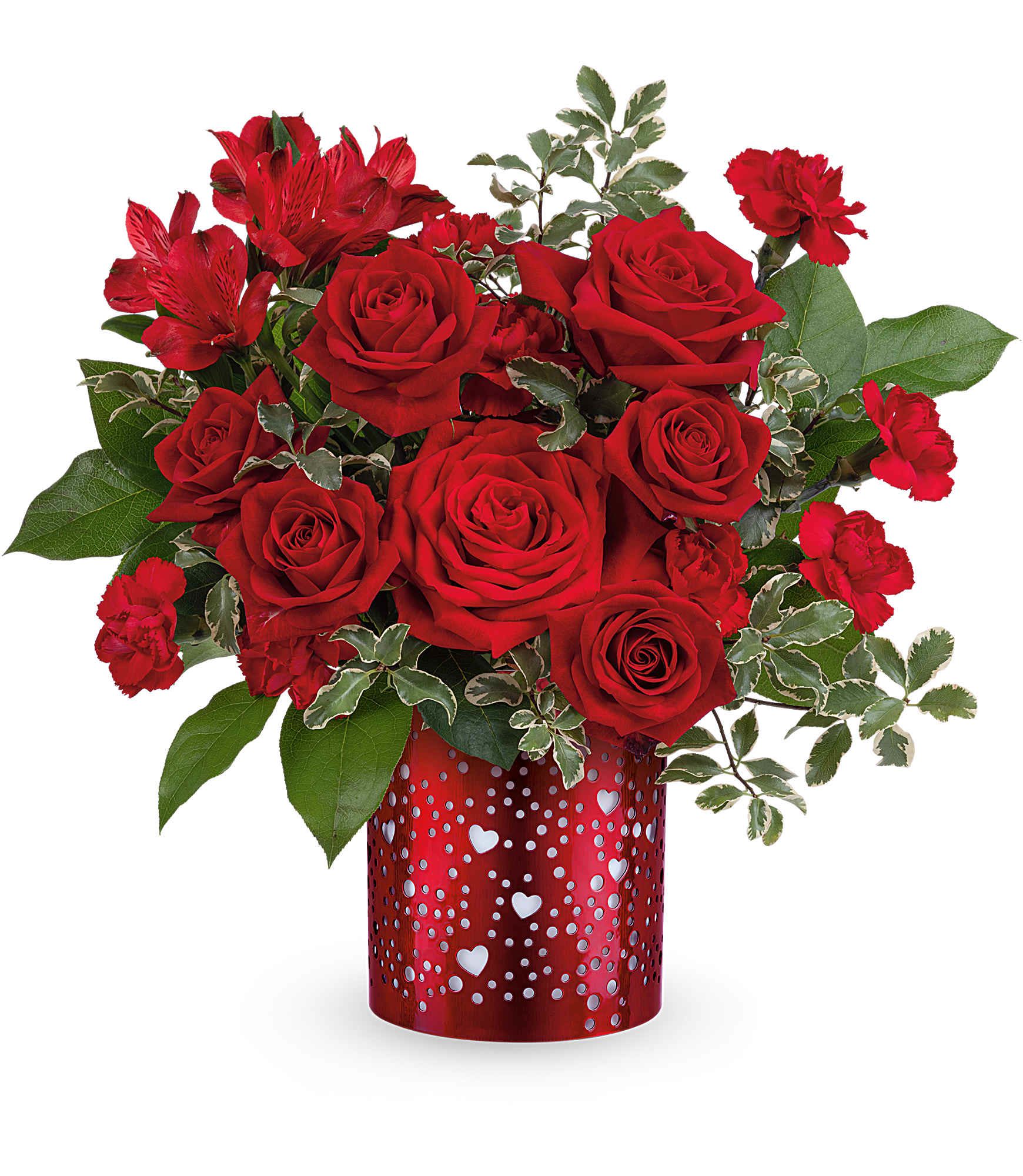 I Heart You Bouquet - Let your love shine with Teleflora's I Heart You Bouquet, featuring a passionate mix of red roses, alstroemeria, and carnations arranged in a red metal lantern adorned with charming heart and dot cutouts-a heartfelt Valentine's Day keepsake. Teleflora's I Heart You Bouquet includes red roses, red spray roses, red alstroemeria, red miniature carnations, lemon leaf, and pitta negra, beautifully arranged in Teleflora's I Heart You Lantern, a red metal lantern with heart and dot cutouts. Approximately 12 3/4" W x 12" H 