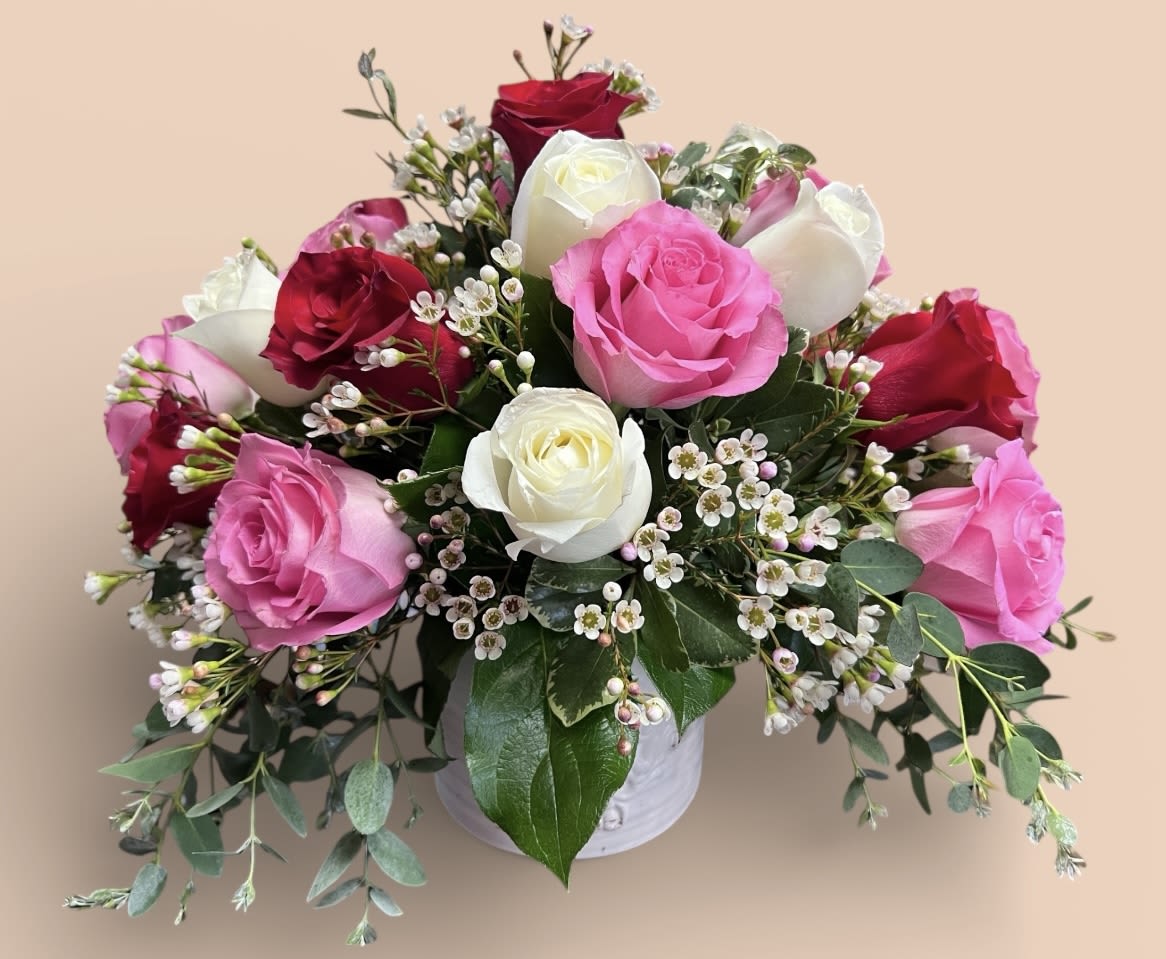 A New Day - Beautiful designed 16 mixed roses in a white ceramic container. 