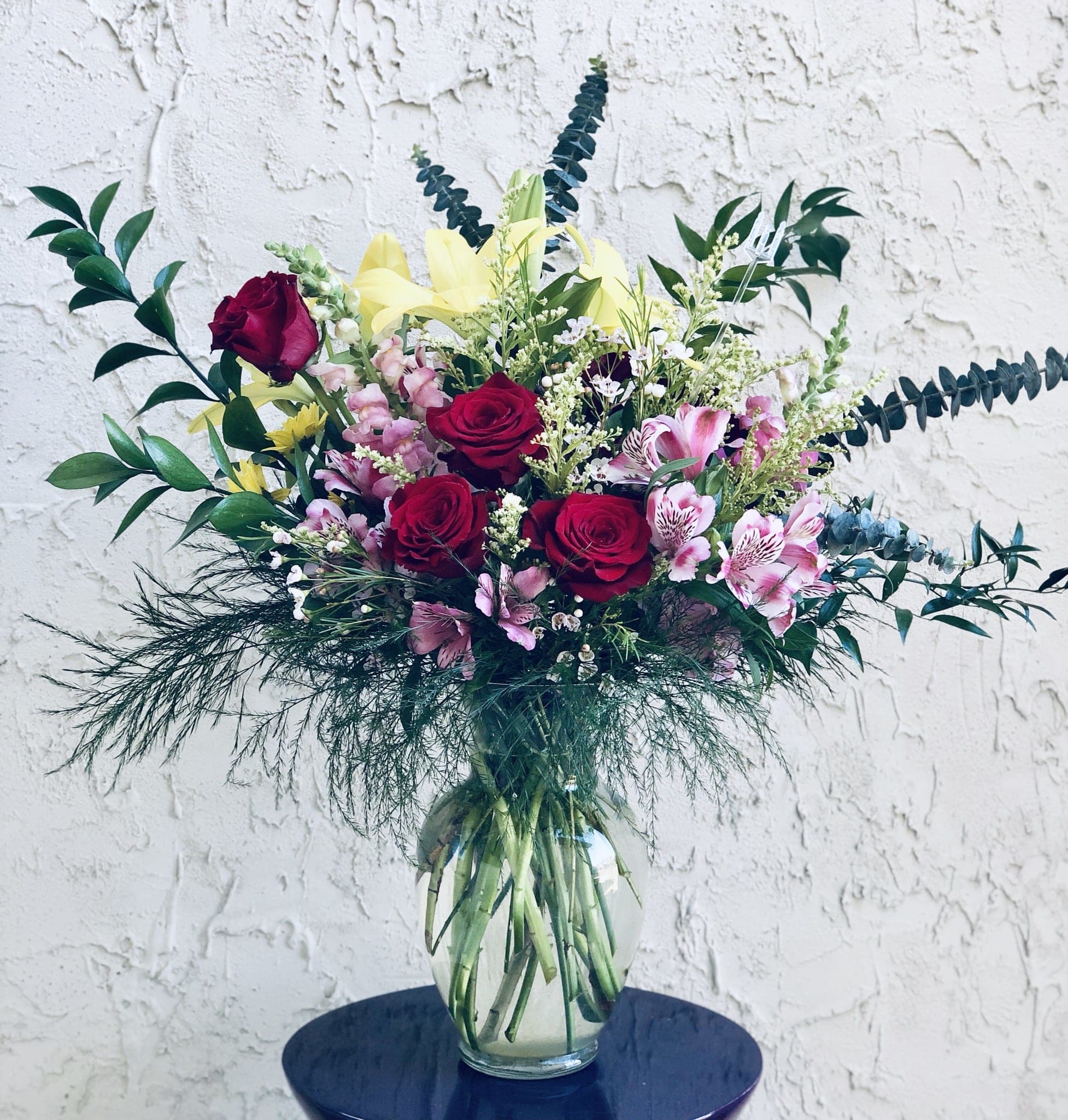 Garden Surprise - A garden mix that will surely brighten their day. 9” vase.