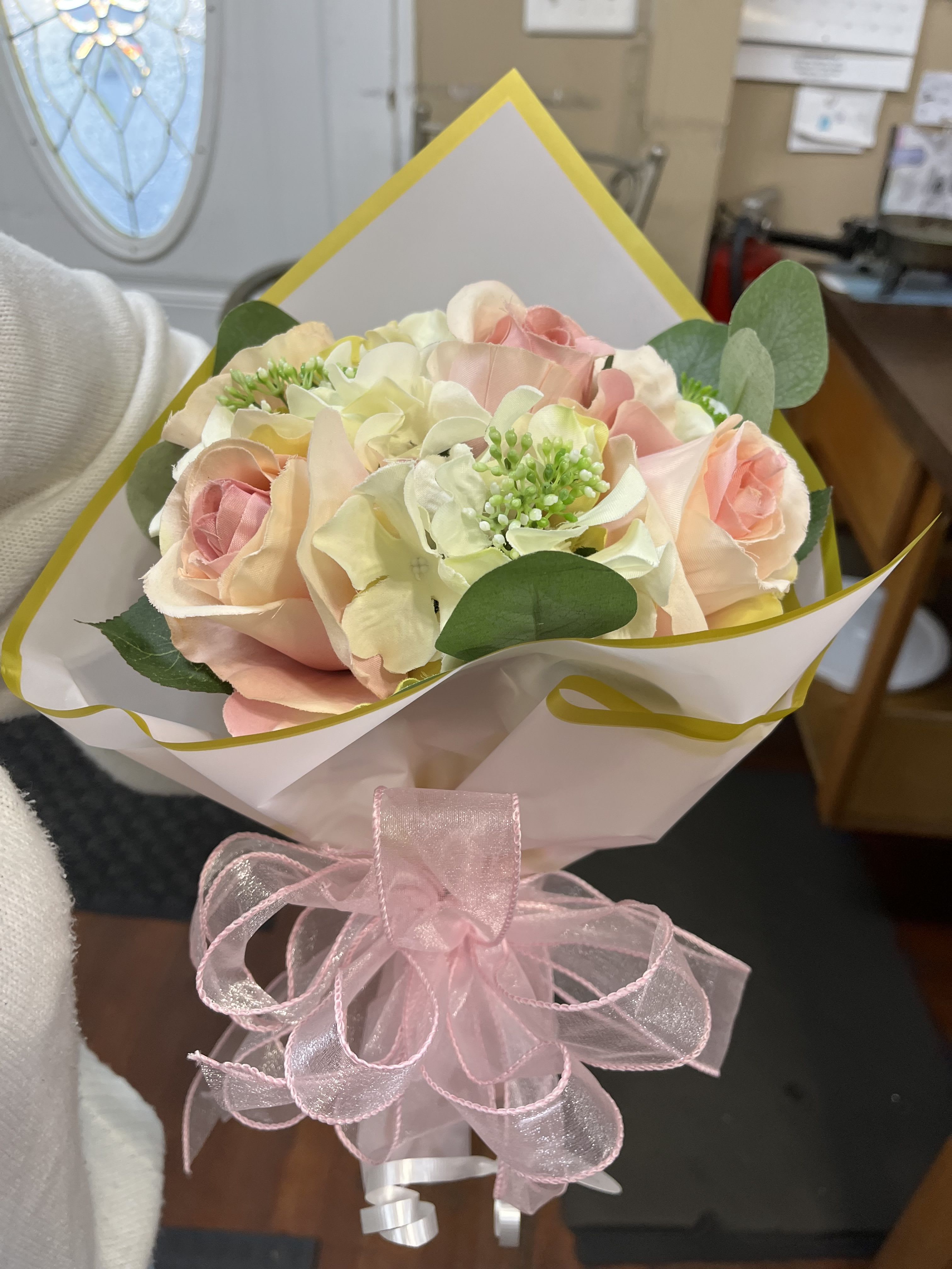   SILK Wrapped Bouquet - Pink-redible! This glamorous, girly bouquet of SILK pink and white roses is dressed up and wrapped with trendy wrap and satin ribbon.
