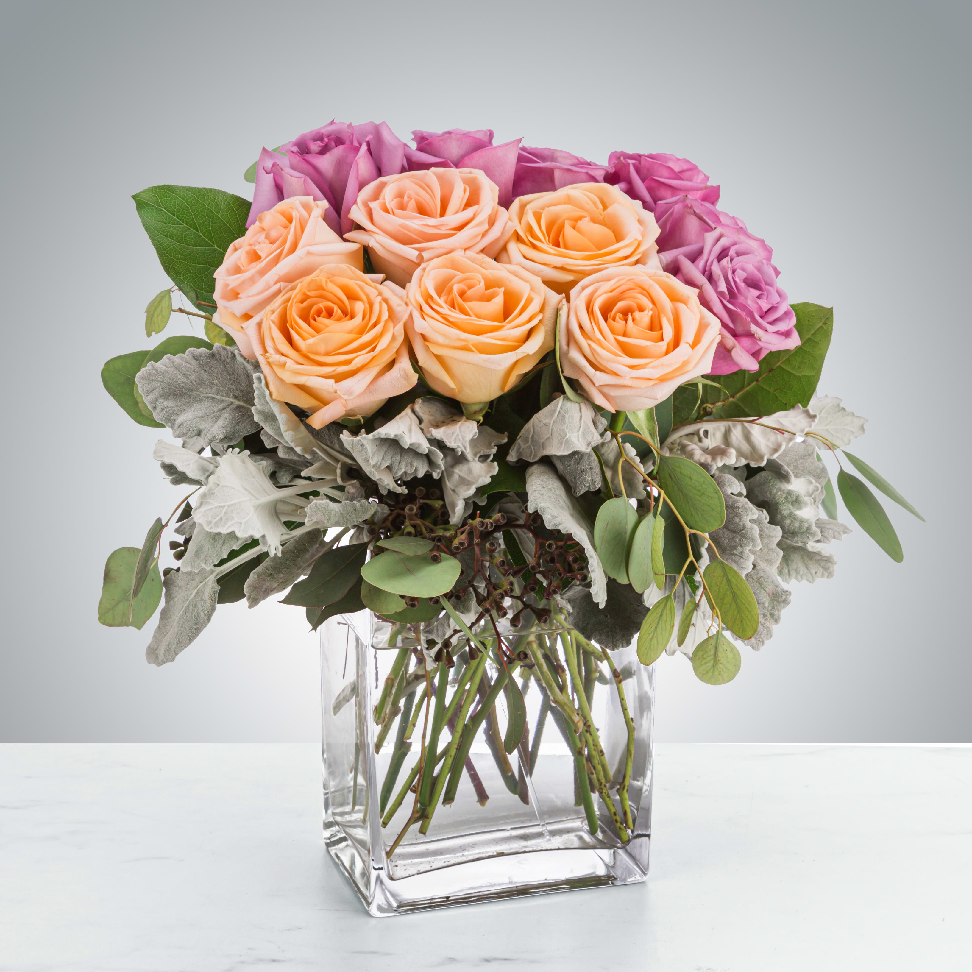 Gemini - This luxury arrangement is a lovely and soft rose arrangement that will surely make the recipient gasp. Perfect for Valentine's Day, Anniversaries, or saying "I love you".  Approximate Dimensions: 15"D x 18"H