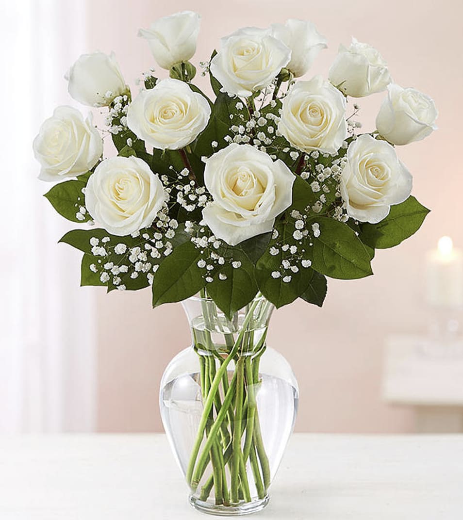 Dozen Long Stem White Roses - A dozen white roses are a classic gift! Perfect for any expression of pure love is intended. 