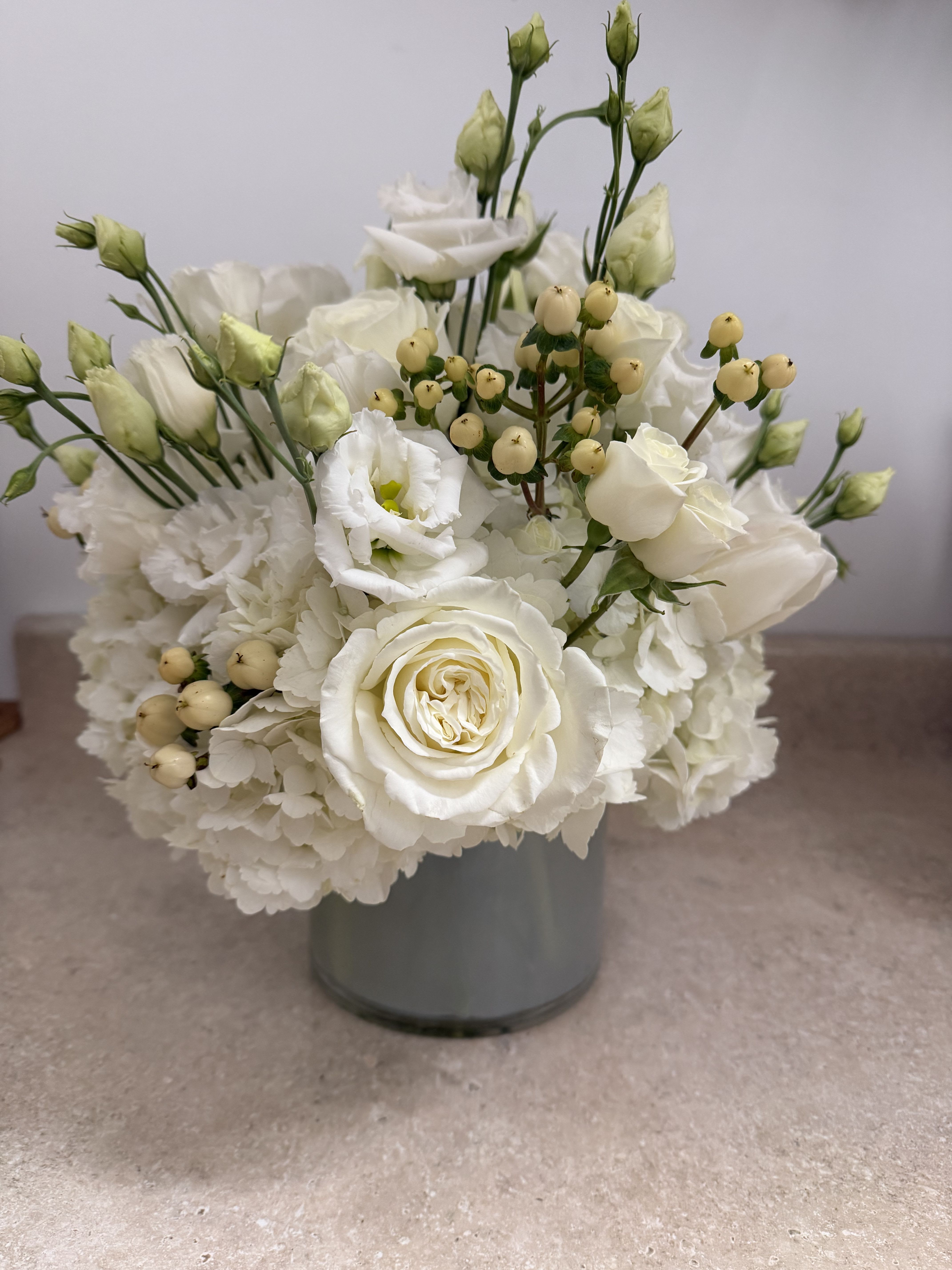 HYPERICUM SNOW - an extremely impressive combination with extravagant flowers, white Hypericum, lisianthus, white Playa, white tulips, spray white rose,
