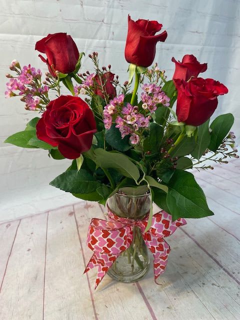 6 Red Valentine’s Roses - Send your loved one 6 beautifully arranged red roses with some Valentine's decorations!