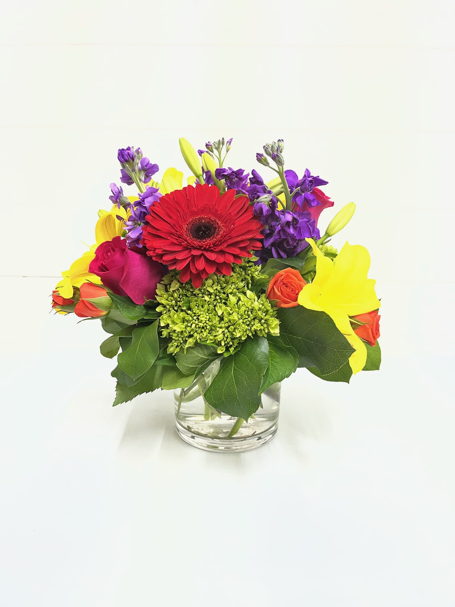 Colors Of Love - Bright and cheery with all of the colors of love! For the brightest person you know (: Assortment of lilies, tulips, gerbers, iris, hydrangeas, stok, roses, snapdragons, etc...   Flowers and color may vary depending on availability in order to keep same scheme/style.