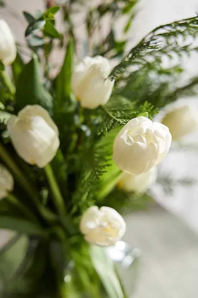 Tulips and eucalyptus -  A mixed bouquet with  white blooms, showcasing, white tulips, and eucalyptus 