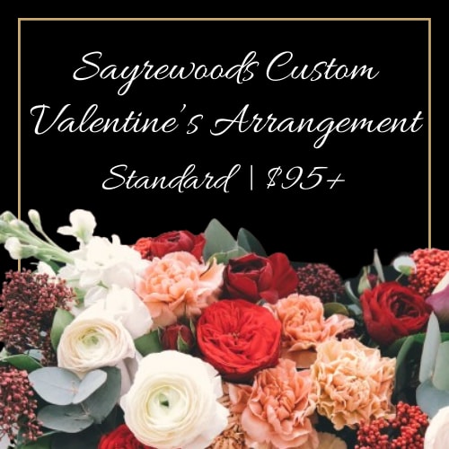 Sayrewoods Custom Valentine's Arrangement | Standard - Can't decide on which beautiful arrangement to send? Let one of our talented designers make the decision for you. These flowers will arrive beautifully designed in a glass vase for the perfect Valentine's arrangement.