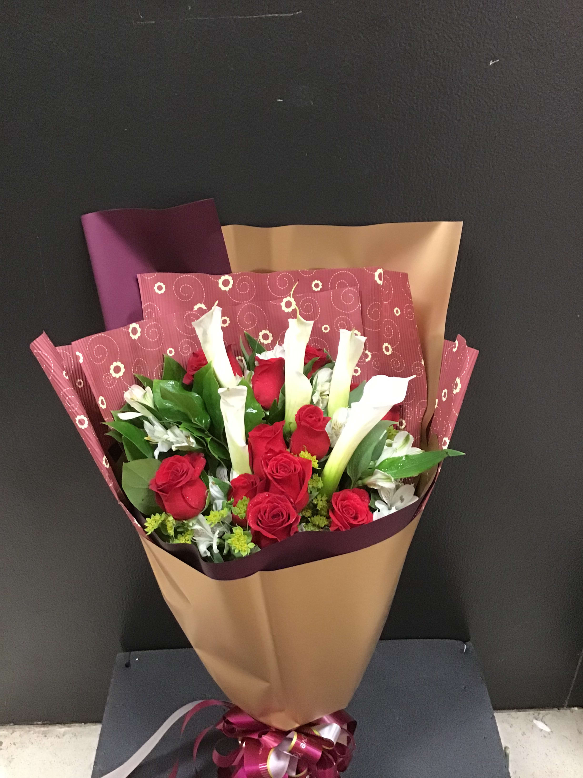 From The Heart Bouquet 2 - white calla Lily and red roses wrap with the burgundy and gold wrapping paper.