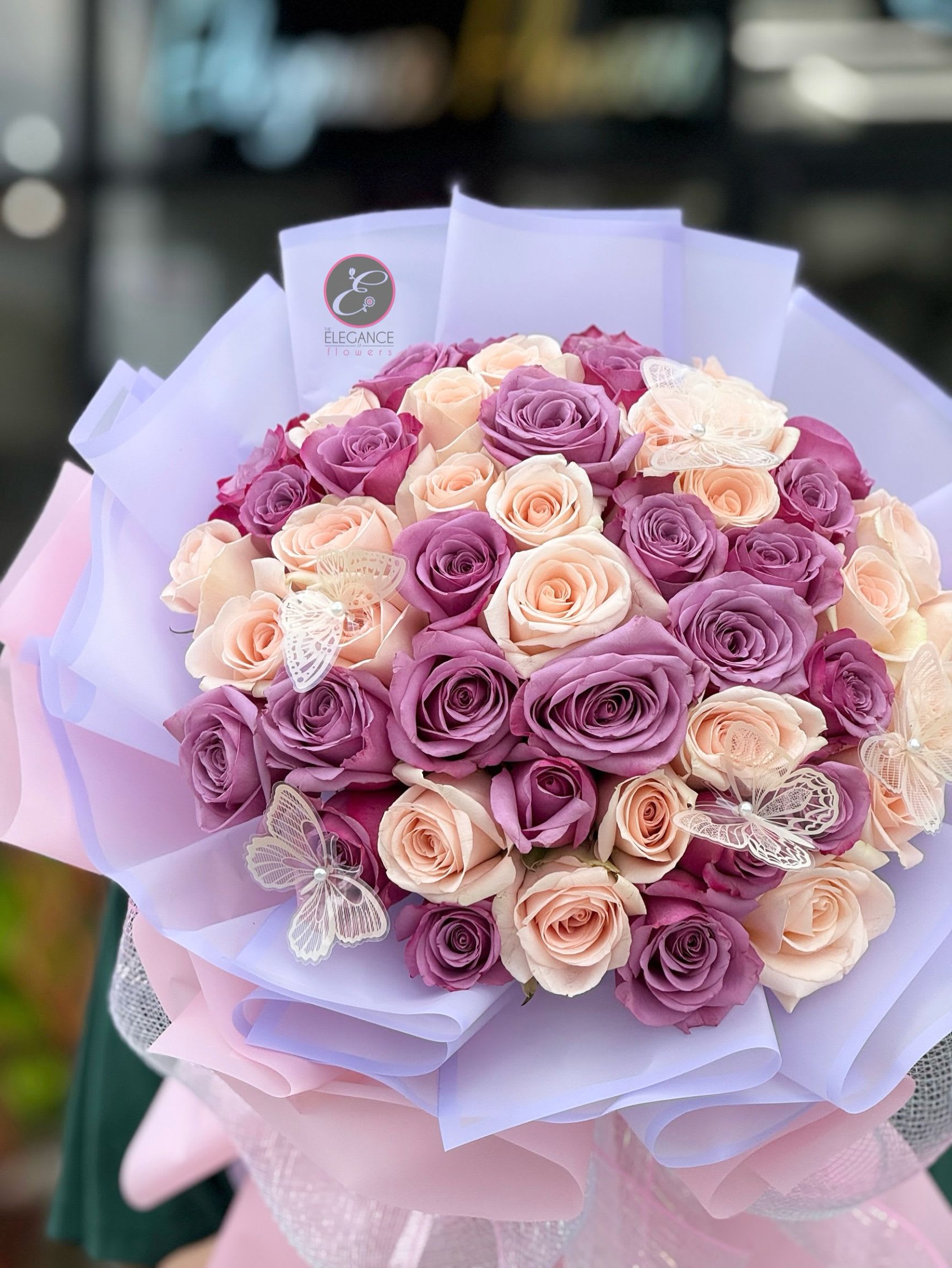 Wrapped Bouquet #3 - Celebrate every moment with our vibrant mix flower bouquet—an explosion of color and joy in every stem.