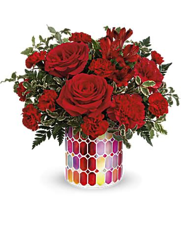 Magnificent Mosaic  - This arrangement made with red roses, red alstromeria, miniature red carnations and red carnations are arranged with pitts and leatherleaf fern 