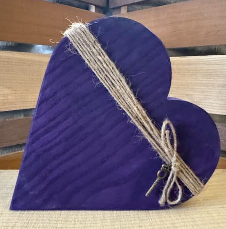 Key To My Heart - This charming wooden heart is wrapped in rustic twine and finished with a decorative key.  Each piece is carefully crafted, making every piece truly one of a kind. Approximate size 9" x 8"