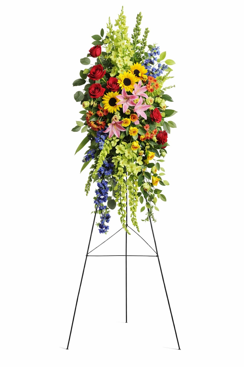 Love Lives On Standing Spray - Colorful Standing Funeral Spray with Sunflowers &amp; Roses  This vibrant standing funeral spray is a heartfelt tribute celebrating life, love, and lasting memories. Featuring cheerful sunflowers, red roses, pink lilies, blue accent flowers, and bright seasonal blooms, this sympathy flower arrangement is beautifully balanced with cascading greenery for a full and elegant presentation. The mix of warm and uplifting colors symbolizes joy, remembrance, and the beauty of a life well lived.  Arranged on a standing easel, this colorful sympathy spray creates a meaningful focal point for funeral services, memorials, churches, chapels, and celebration-of-life ceremonies. Professionally designed by our florists, it is a thoughtful and expressive way to honor a loved one and offer comfort to family and friends.  Available for funeral flower delivery to churches, chapels, and service locations.