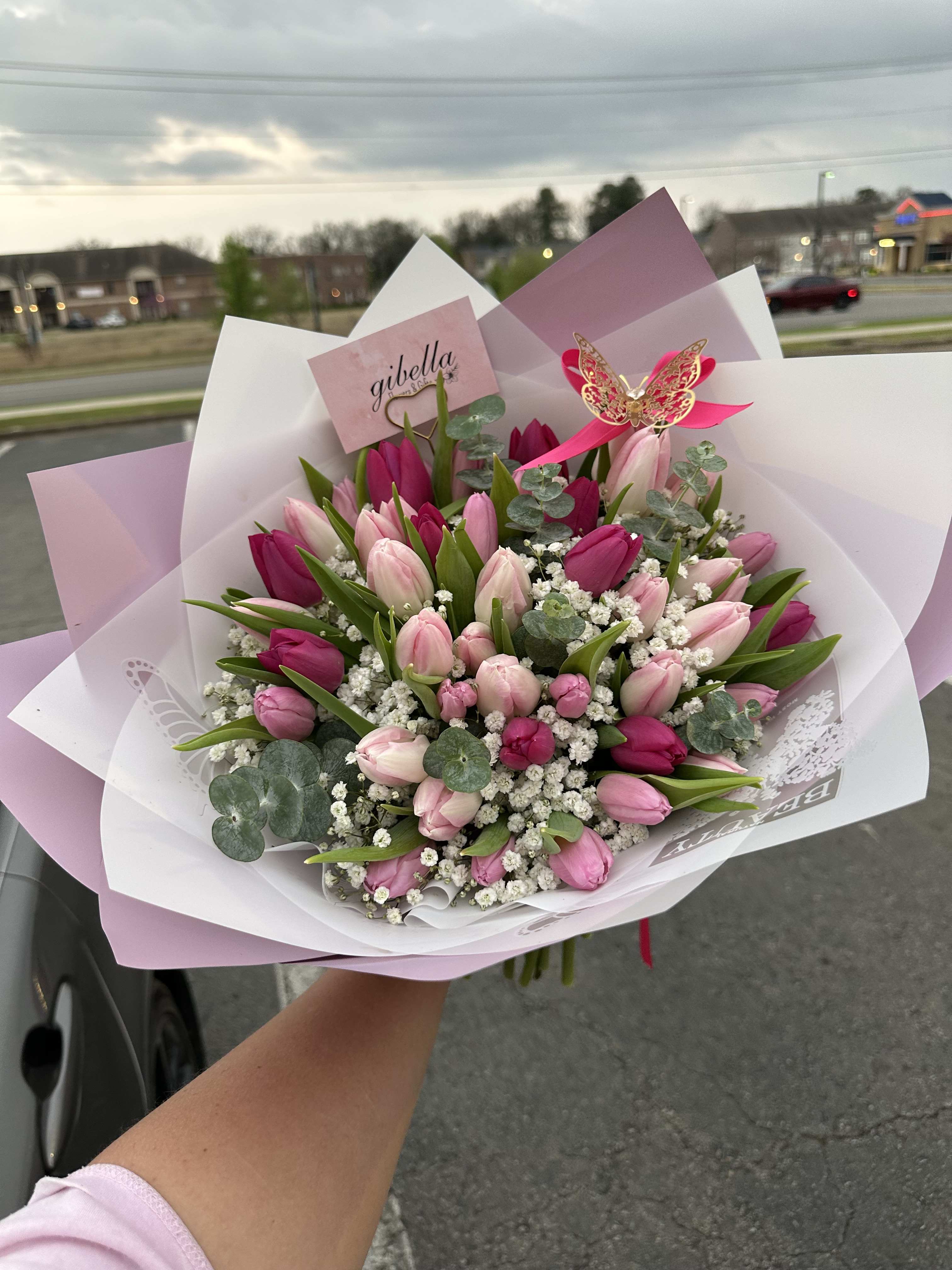 Garden of tulips  - Tulips in a base of garden; greens and filler 