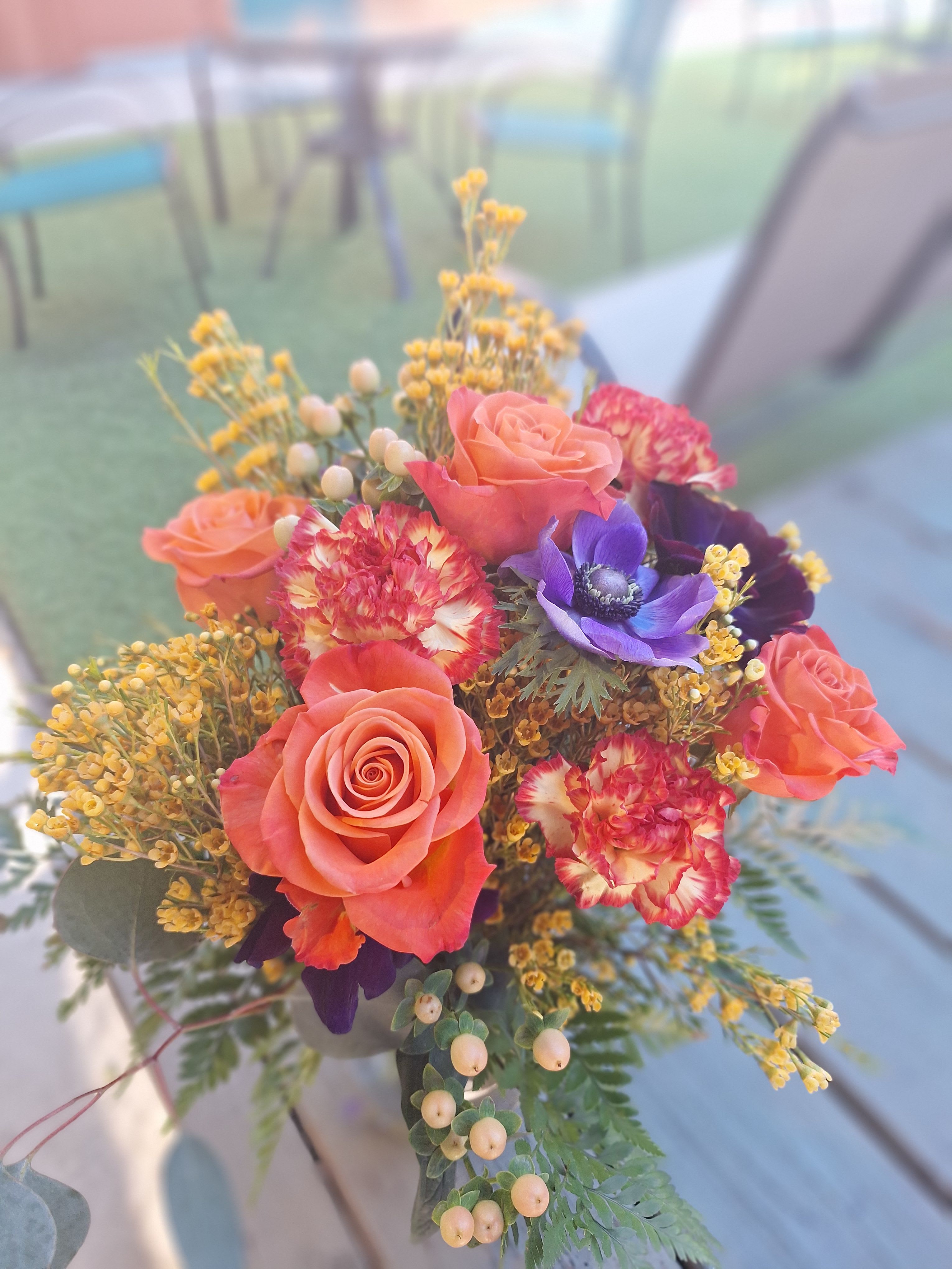 Summerhill Saint - Summerhill Saint is a vibrant floral arrangement inspired by the tragic death of Rayshard Brooks in June 2020. Brooks was fatally shot by Atlanta police officers outside a Wendy's restaurant, leading to widespread protests and calls for justice.The bouquet serves as a tribute to Black Americans who have lost their lives to police violence. The arrangement features bold orange, purple, and lavender hues, incorporating roses, carnations, anemones, waxflowers, and lush greenery.  