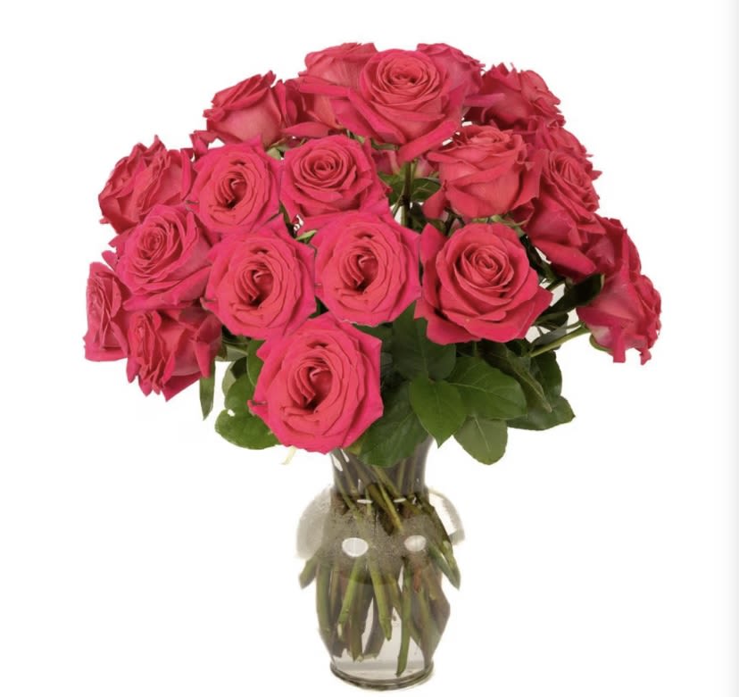 Two Dozen Hot Pink Roses  - Bold, unapologetic, and impossible to ignore—two dozen hot pink roses make a statement that says all in. Saturated with vibrant color and lush, full blooms, this arrangement is pure confidence wrapped in romance. Hot pink roses symbolize admiration, joy, and fearless love, making them perfect for grand gestures, celebrations, or when subtle just won’t do.  Designed to feel luxe and abundant, these 24 roses deliver maximum impact with a modern, fashion-forward edge—dramatic, passionate, and completely unforgettable.