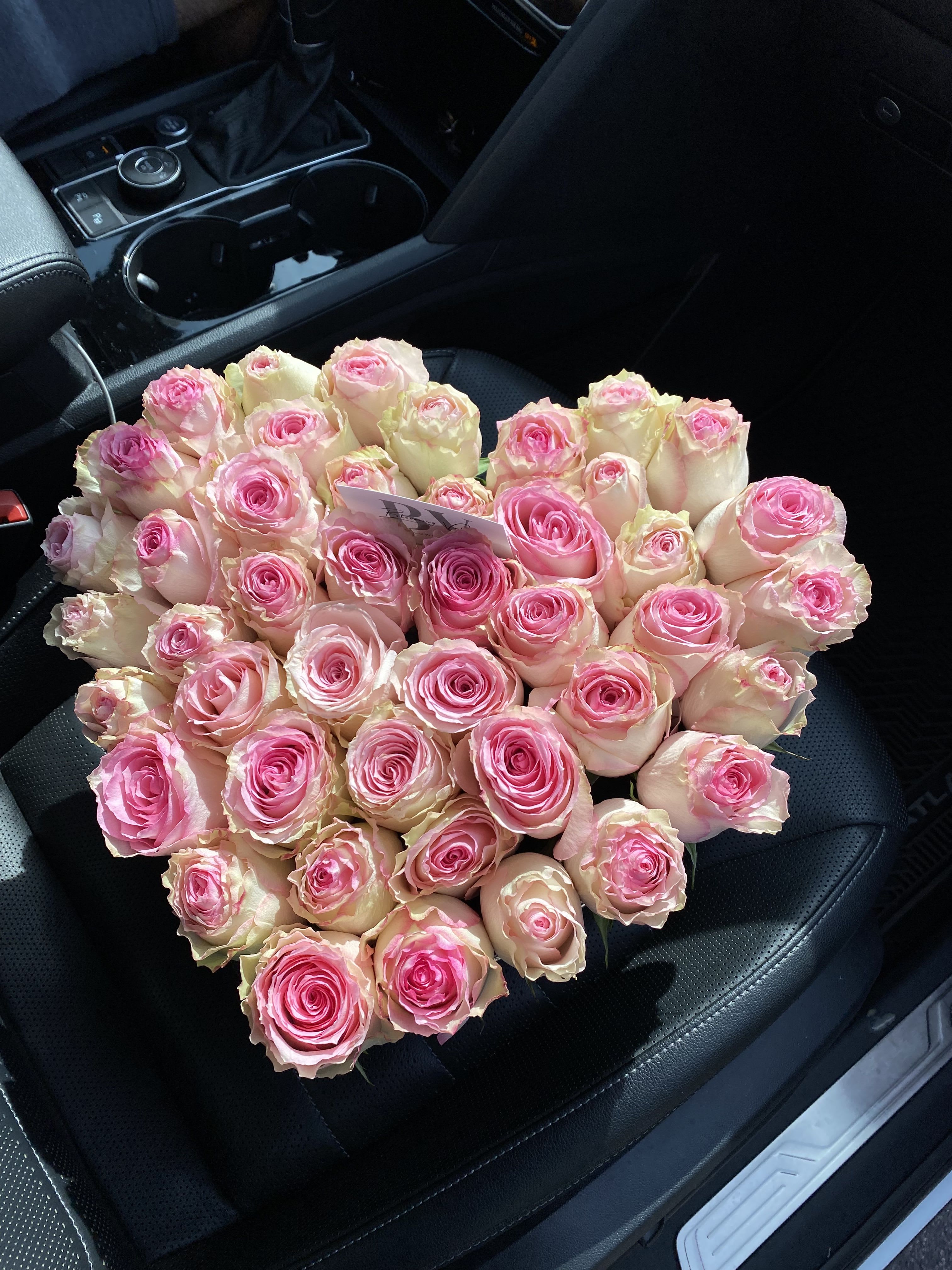 Sweetheart Bloom - A tender heart-shaped arrangement of delicate cream and pink roses, perfect for expressing love, admiration, or sweet affection. Whether it’s a romantic surprise or a heartfelt gesture, this floral heart speaks the language of love without saying a word.