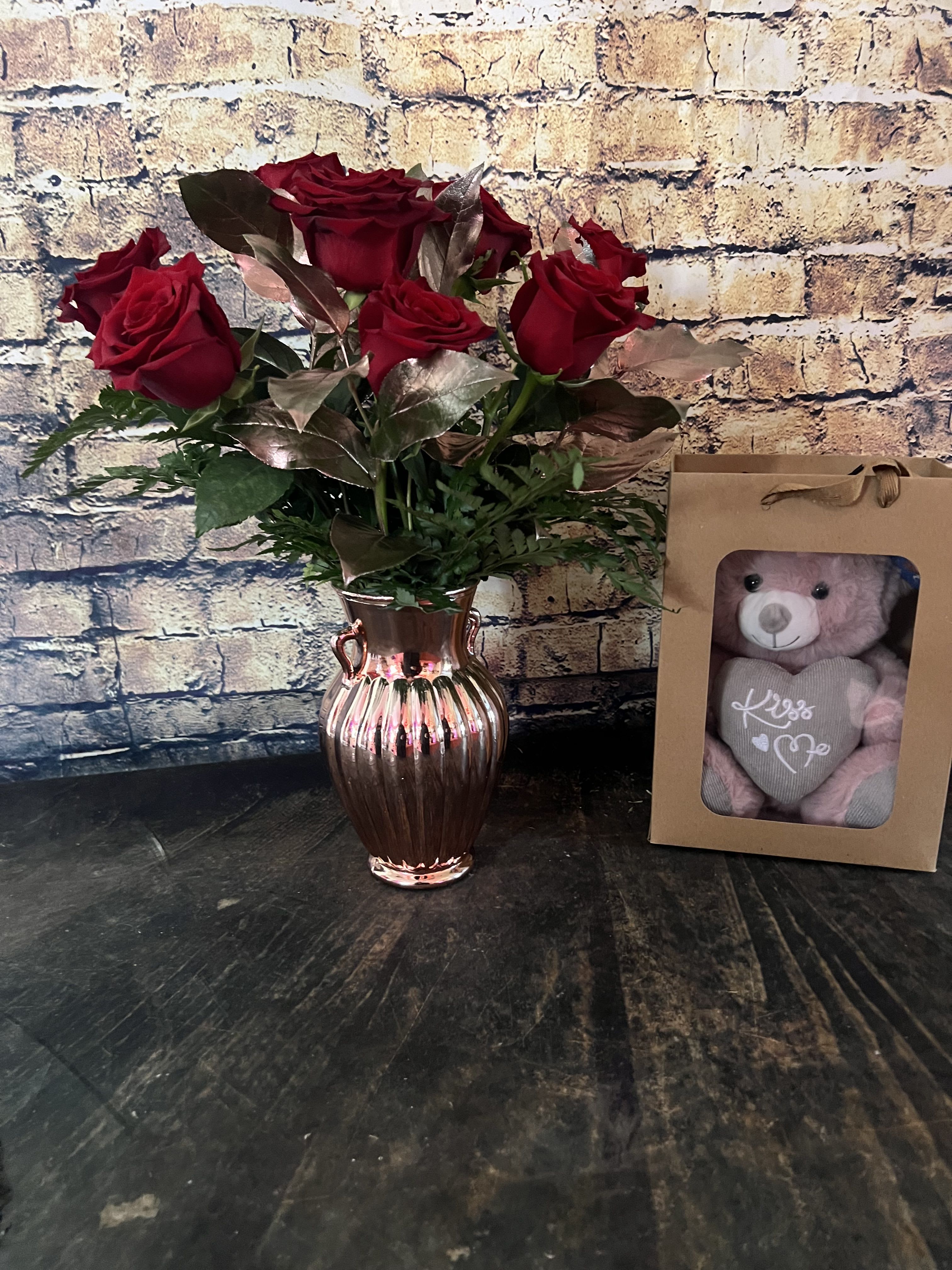 Rose Gold Dream Bundle  - Nothing is more stunning than a classic red rose accented with Rose Gold Leaves in a Rose Gold Vase!  Sure to turn heads at that special someone's office.  Includes a special Teddy in a Kraft Bag to complete the gift!