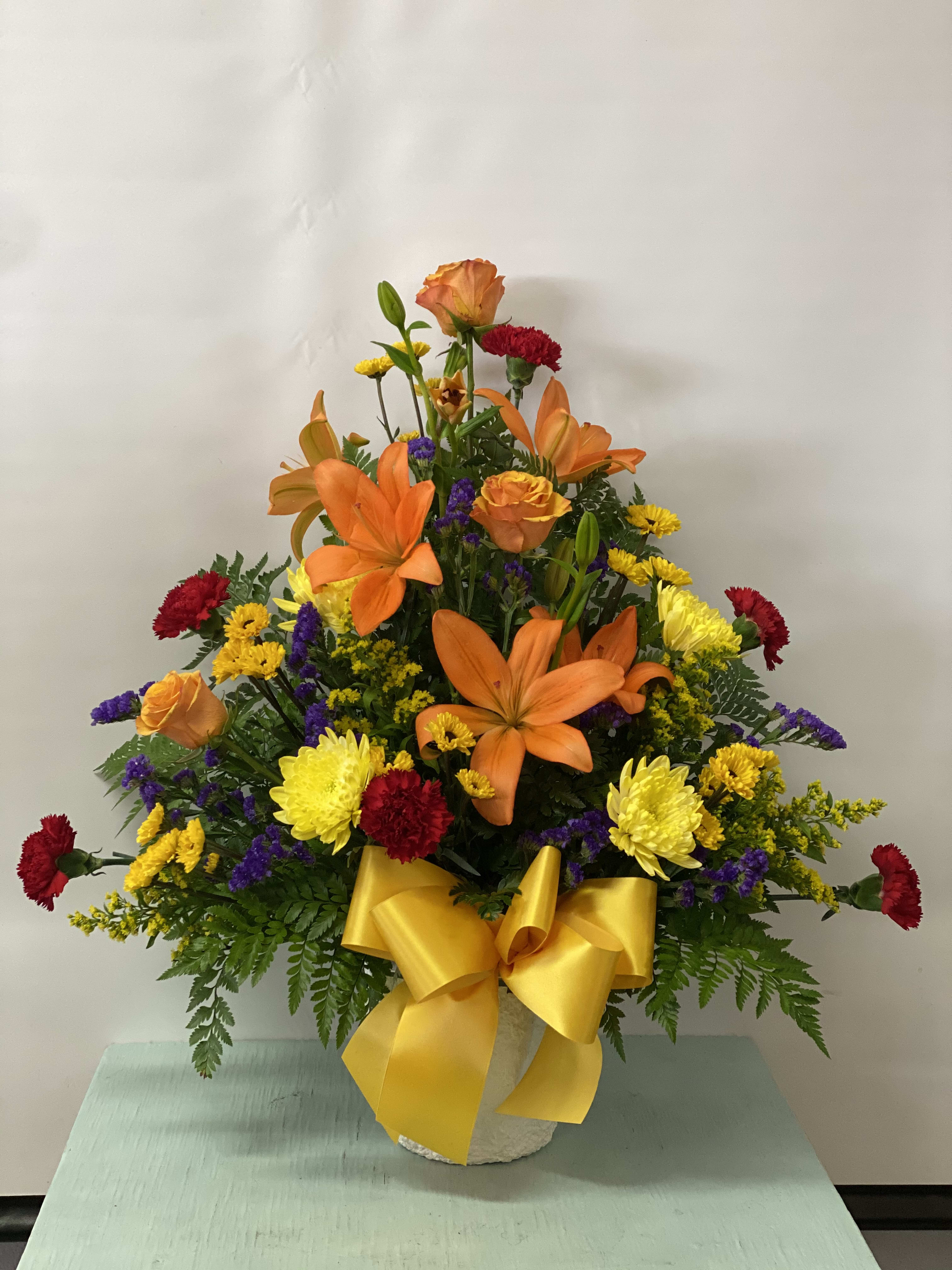 Sympathy #6 - Sympathy Basket Arrangement designed in a Paper Mache container. One sided style. Color can be modified depending on availability.