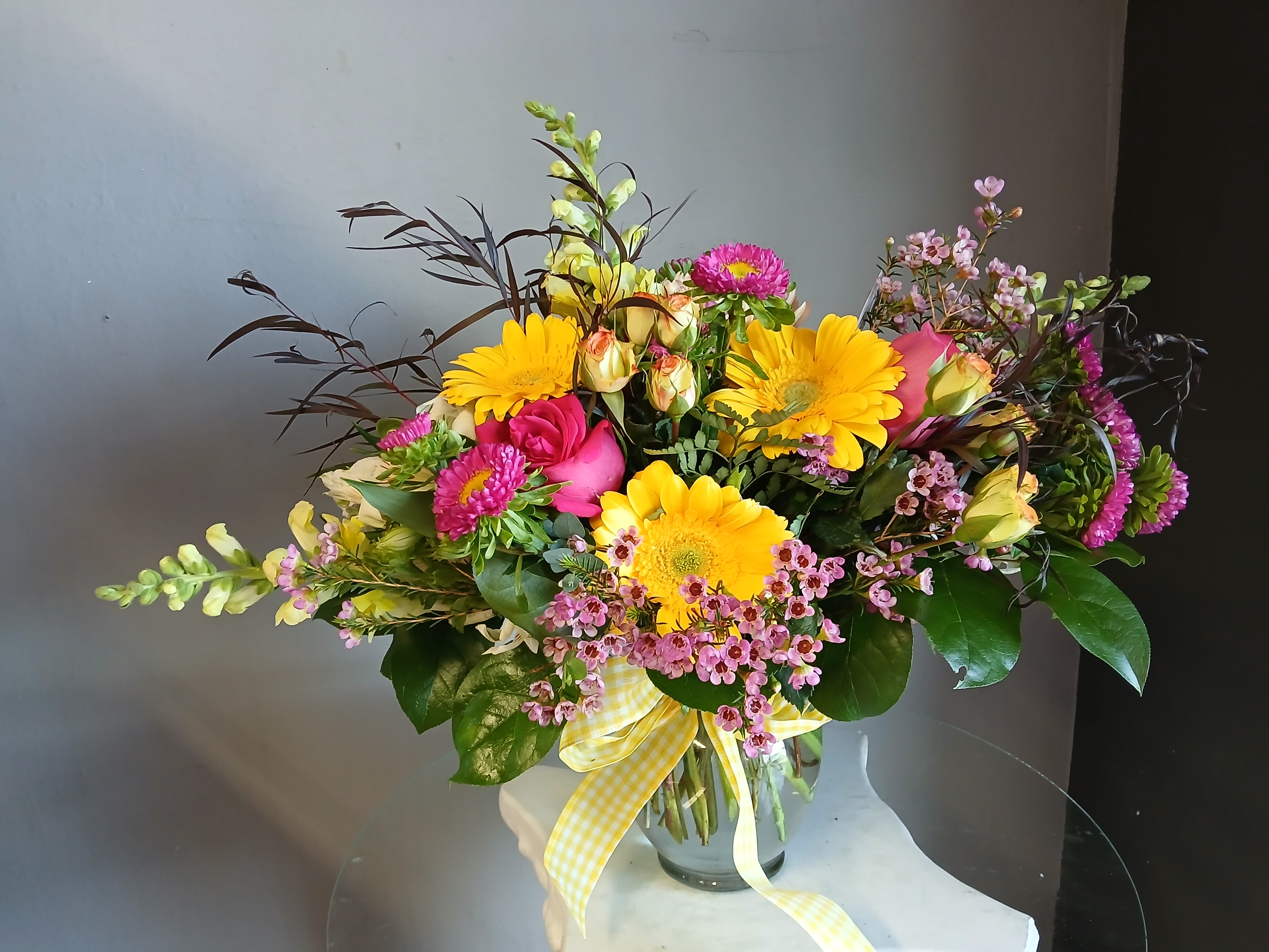 # 109 Winter Floral Arrangement - A beautifully selected bunch of the freshest flowers in a vase uniquely arranged by hand. Fun and festive holiday arrangement 