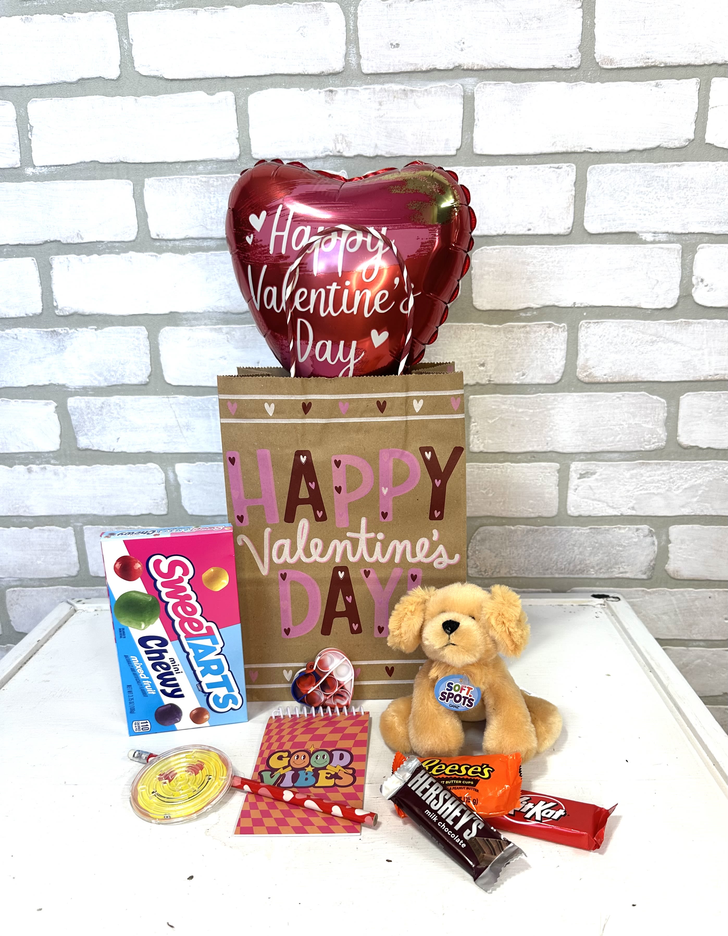 Puppy Love Kids Special  - A Valentine's Day kids tradition! A gift bag filled with plush puppy (breed will vary), mixed bag of small candies, theatre box of candy, valentines balloon, and a popping toy. 