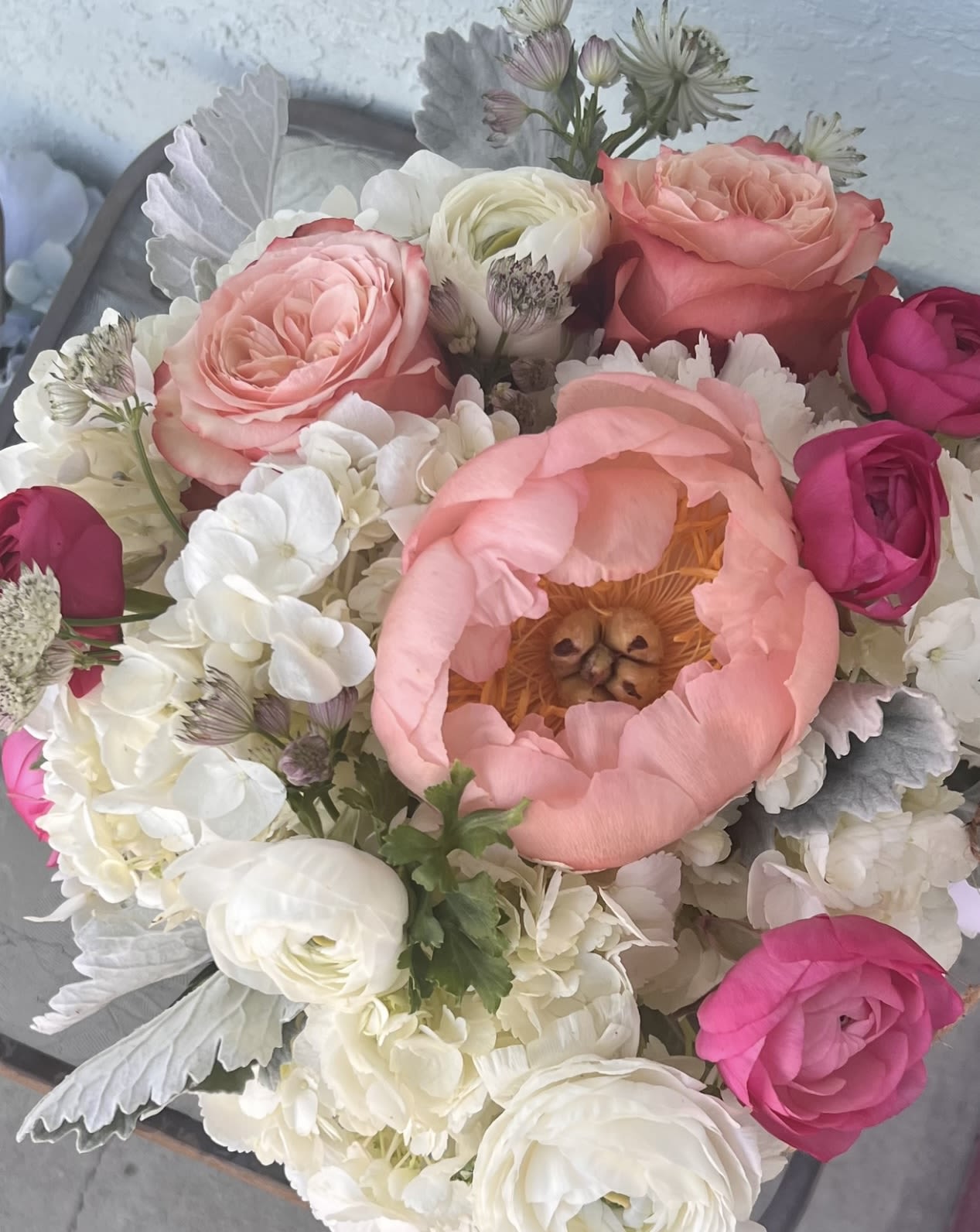 Softly wild  - An abundant blend of soft pinks and creamy whites, featuring sculptural blooms and delicate textures for a romantic yet contemporary floral moment.