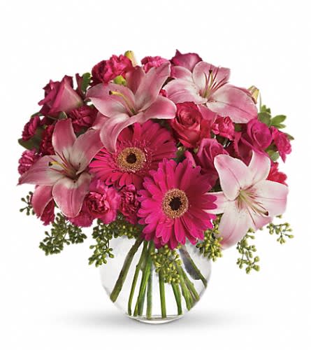 A Little Pink Me Up - Youthful. Graceful. Beautiful. These are just a few qualities that come to mind when gazing at a gorgeous bouquet of pink flowers. Whether you want this arrangement to say "Happy Anniversary" or "Happy Any Day " you can be sure the day it arrives will be brighter for anyone lucky enough to receive it. Lovely pink roses and asiatic lilies are joined by hot pink gerberas and miniature carnations pink full-sized carnations and more in a clear glass ball. Send this one and life will be a bowl of cheer!Approximately 13 1/4" W x 14 1/2" H Orientation: All-Around As Shown : T10-3ADeluxe : T10-3BPremium : T10-3C