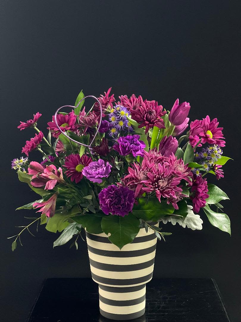 purple royalty  - This arrangement is full of beautiful purple blooms and is perfect for someone you love. 