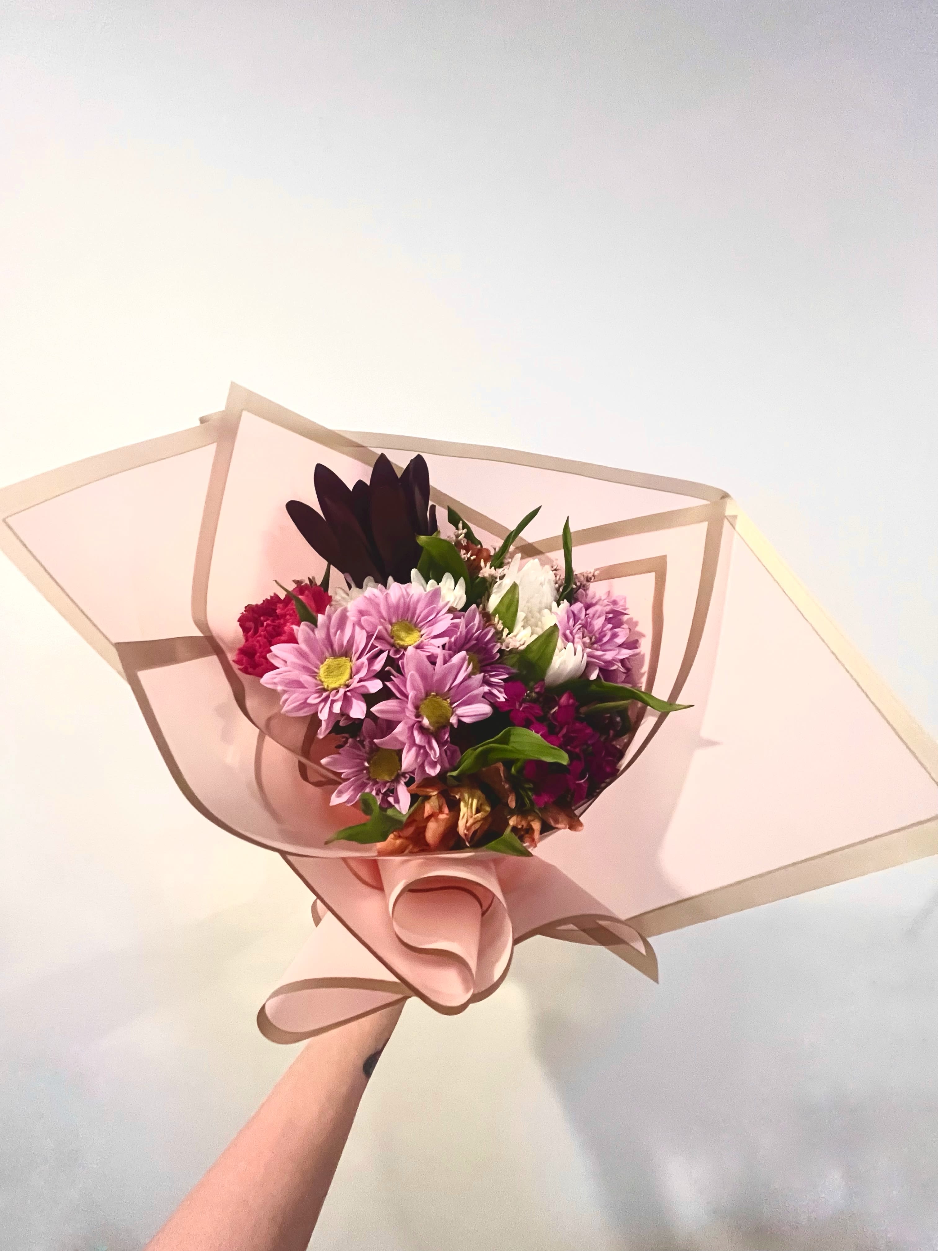 Valentines HandHeld  - Hand wrapped Valentine's Day theme bouquets. 