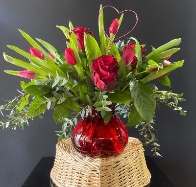 Unique Love - This arrangement is super sweet with tulips and roses.  Fragrant and lovely!