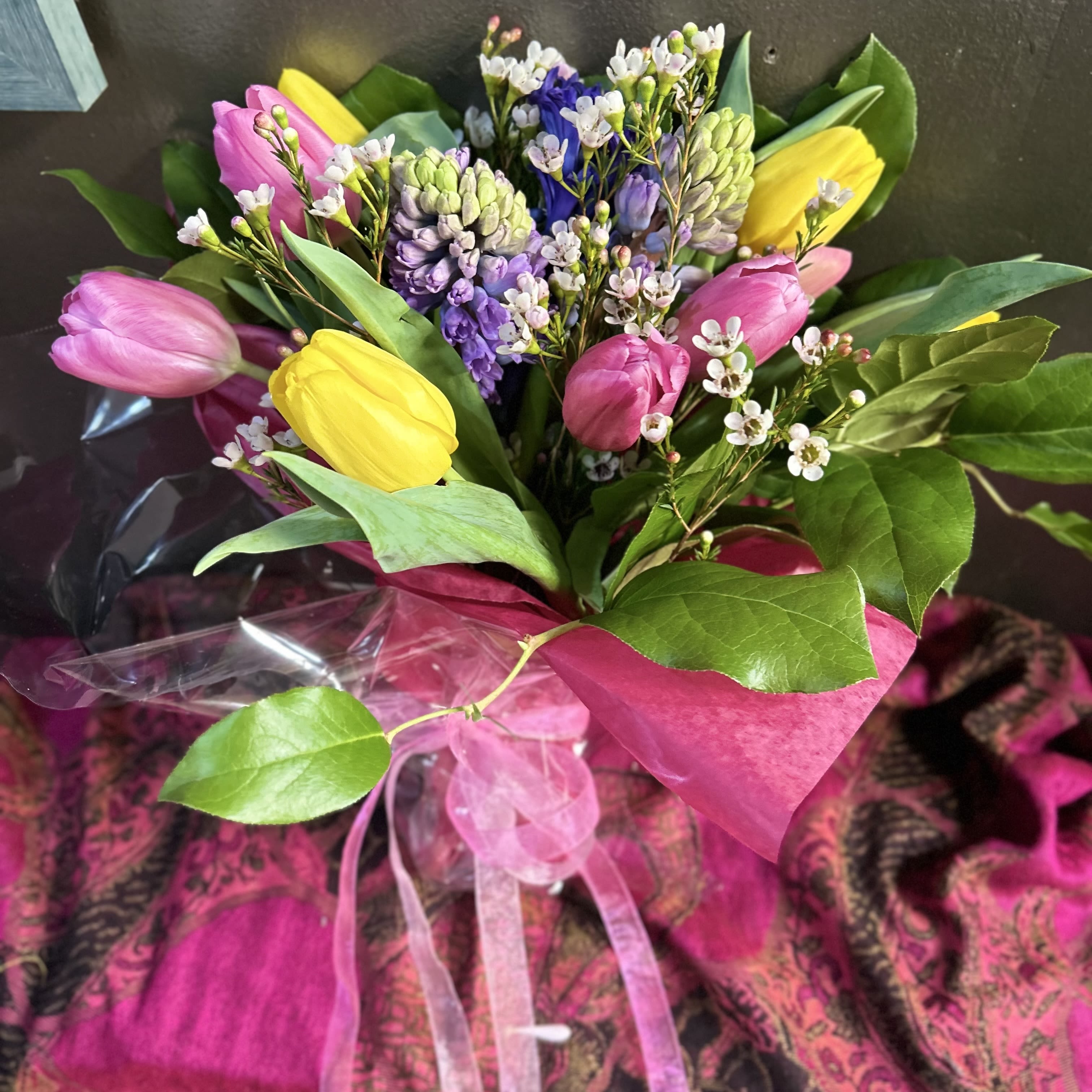 Tulip and Hyacinth Bouquet PICKUP ONLY - PICKUP ONLY This bouquet will feature tulips, hyacinth, colorful filler and greenery. The colors will vary depending on availability and will all look different then the picture. Picture just shows style and approximate size.  Does not include a vase. 