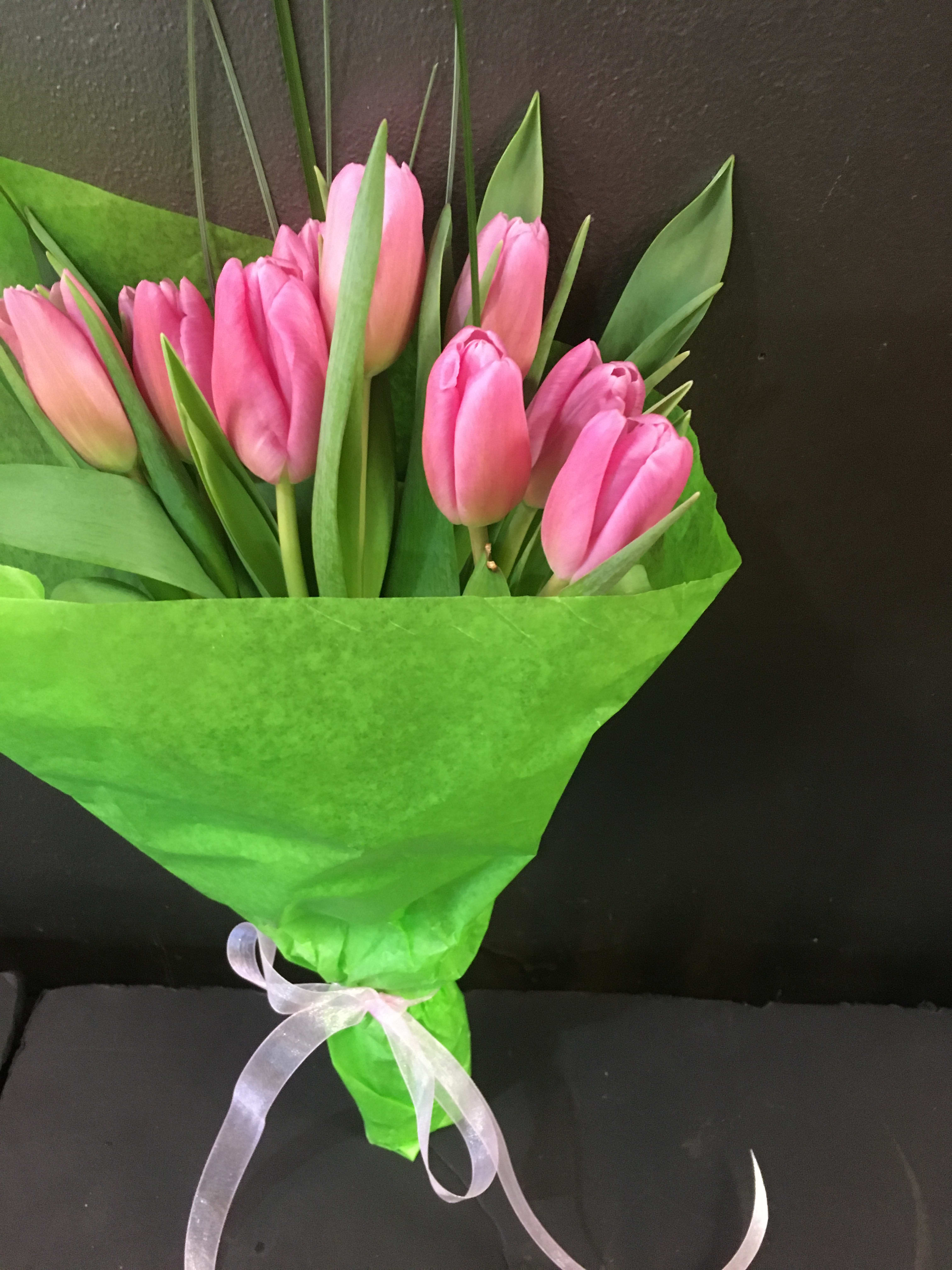 Tulip Bouquet - PICKUP ONLY - Ribbon wrapped bunch of tulips with greenery. Does not include a vase. Colors will vary due to availability, we will do our best to fill color requests. 