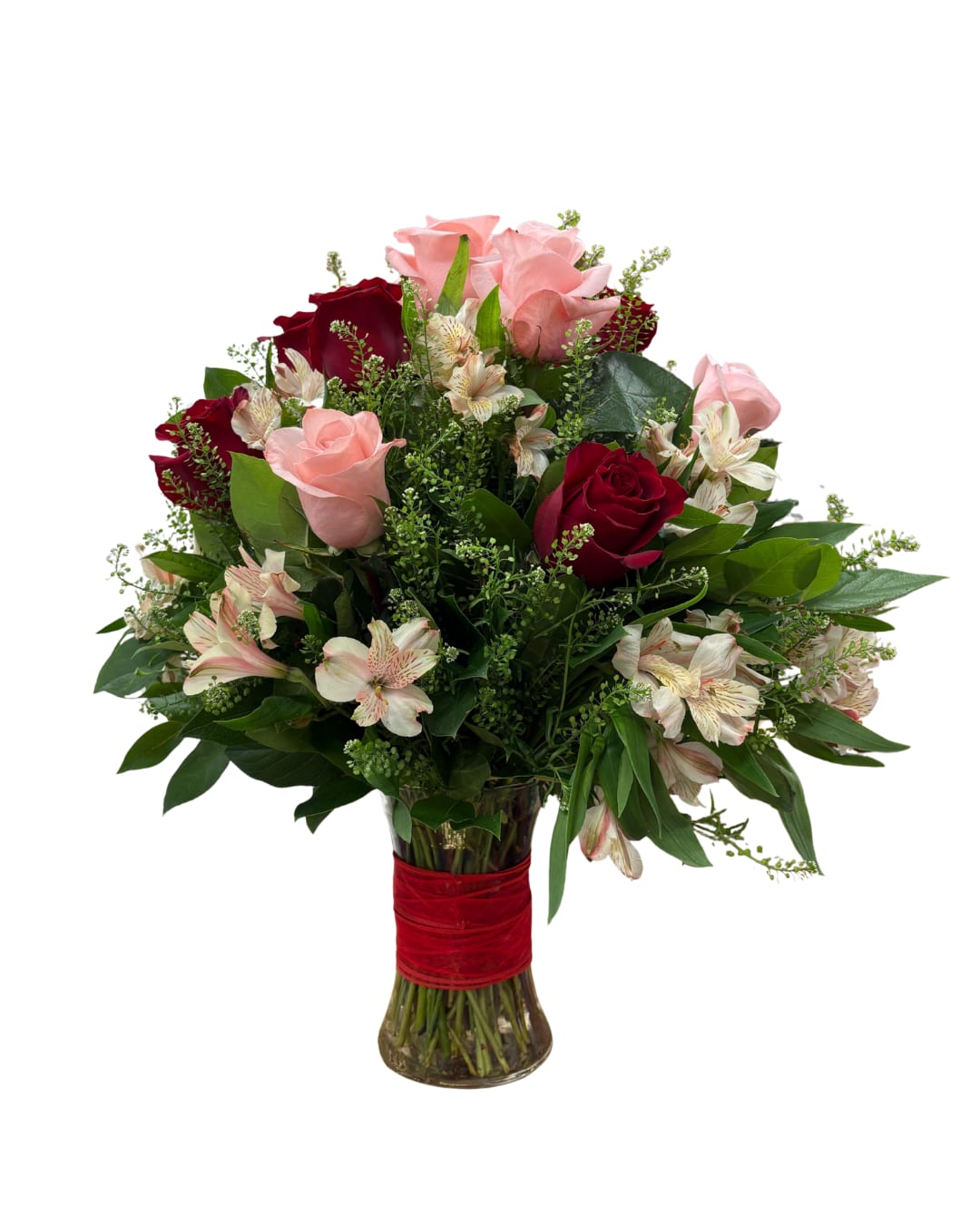 Bouquet of roses in a glass vase - Valentine's Romance - An elegant bouquet of 12 red and pink roses, accompanied by decorative flowers and fresh foliage, presented in a sophisticated glass vase. Perfect for Valentine's Day, anniversaries, or to express love and romance.