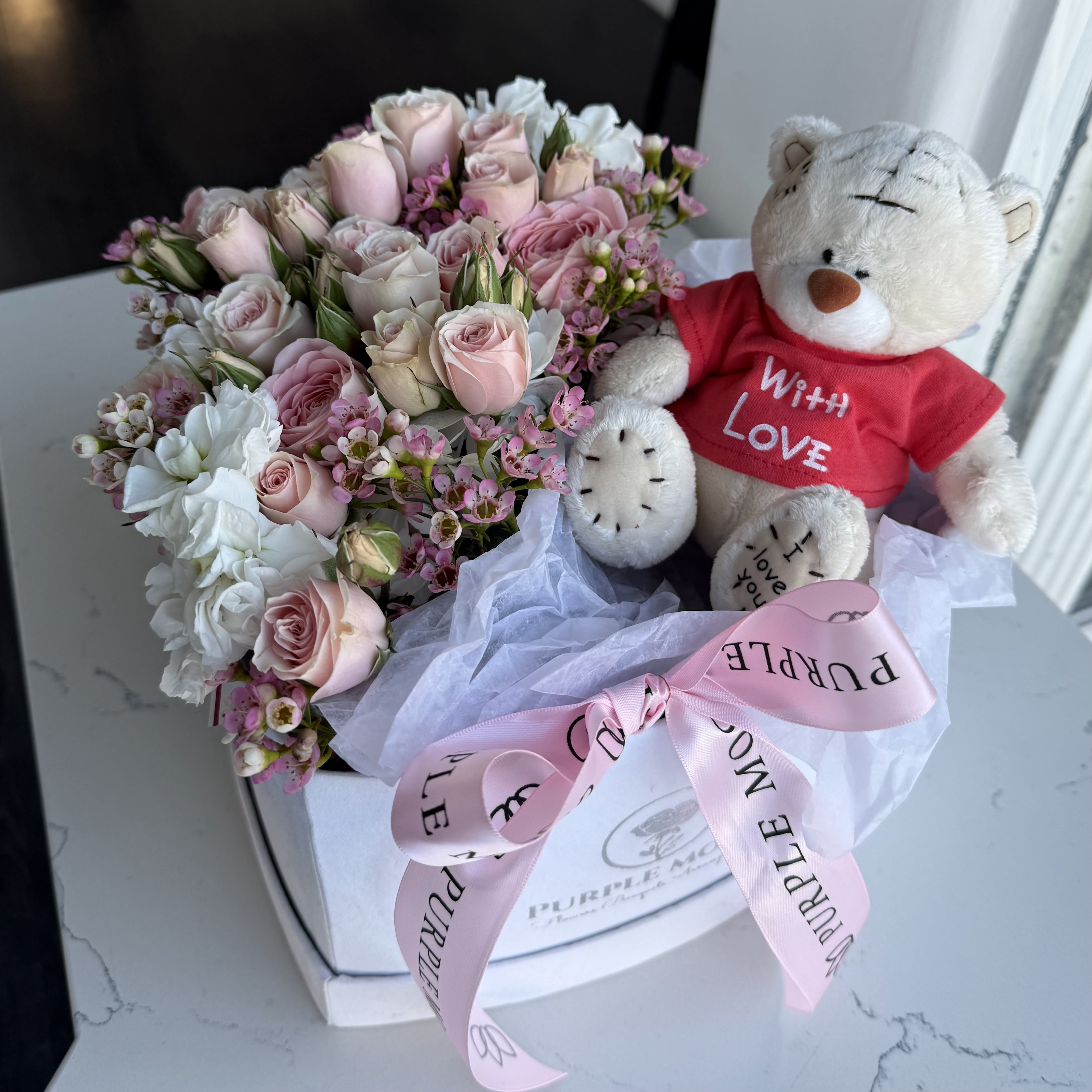 Blush &amp; Bear Heart - A charming floral gift designed to melt hearts. Blush &amp; Bear features a delicate arrangement of soft blush roses and seasonal pastel blooms, thoughtfully styled in Purple Mood’s signature box and paired with a plush teddy bear for an extra touch of warmth. Sweet, elegant, and effortlessly gift-ready, this arrangement is perfect for expressing affection in the most tender way.  Ideal for Valentine’s Day, birthdays, baby celebrations, or simply to make someone smile.