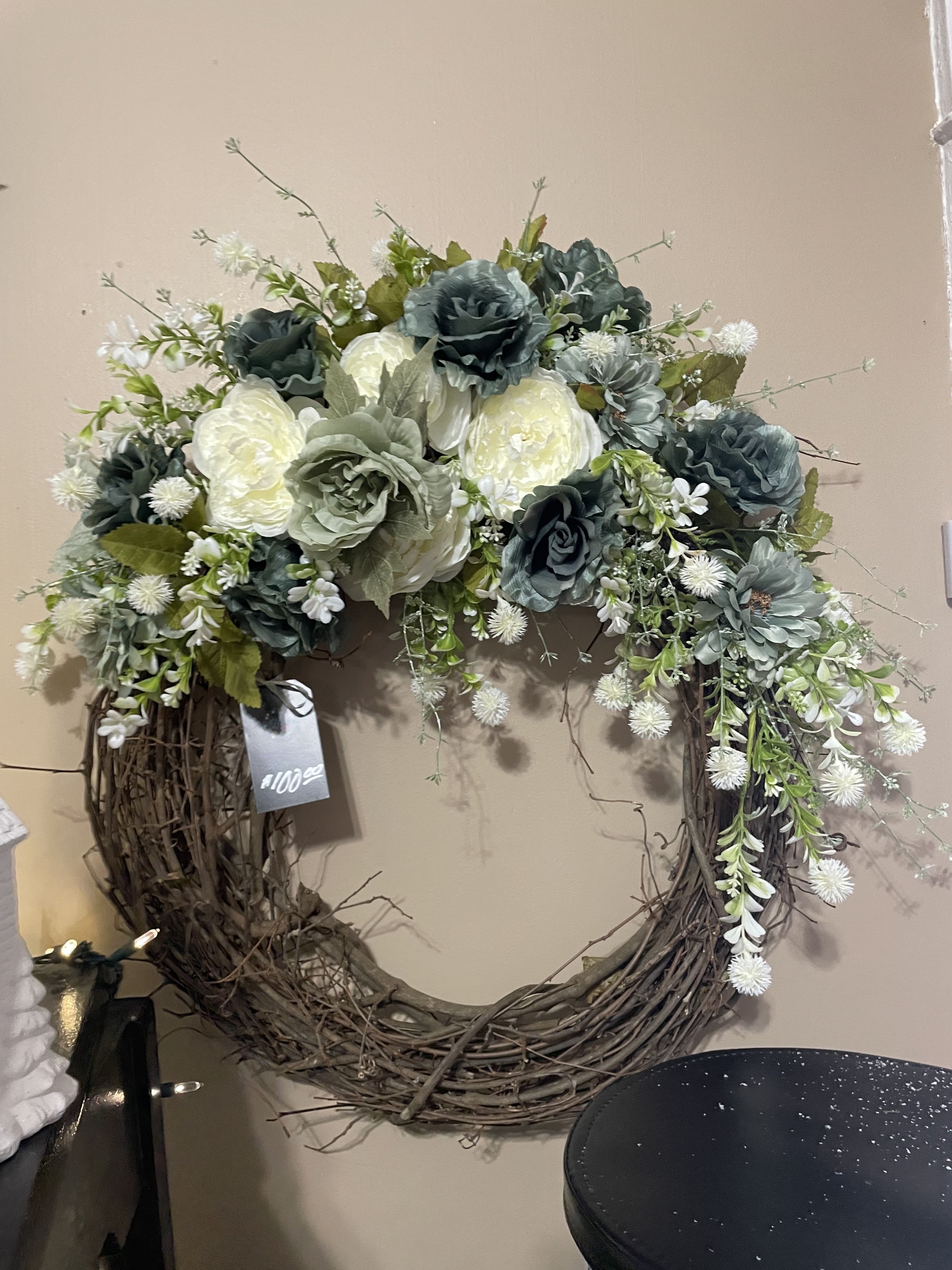 Greens Goddess Grapevine Wreath - Muted Greens and Creams on a grapevine Wreath makes you home feel and look welcoming..on a stand for services