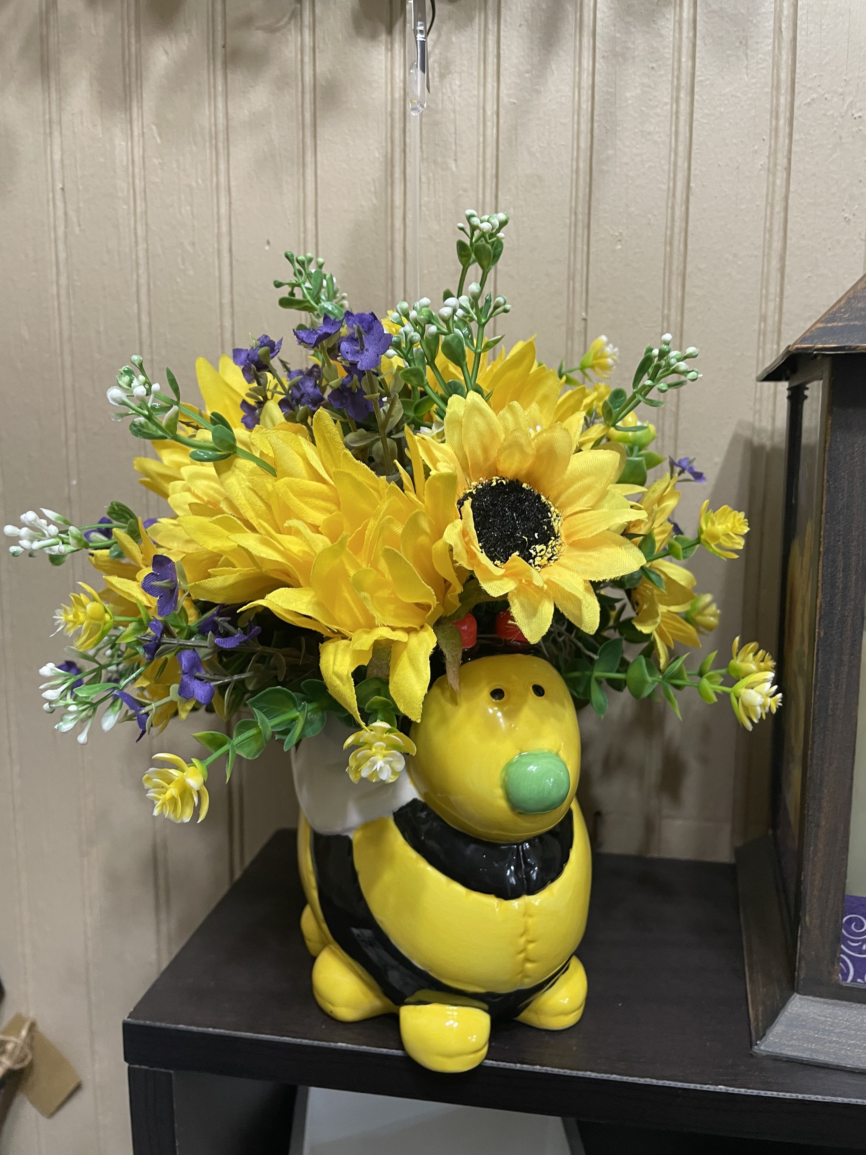 Silk Baby Bee arrangement  - The cutest ceramic bee surrounded by silk flowers in lovely shades.. All sided. Totally bright and cheery for a birthday, get well, new baby or just because.  